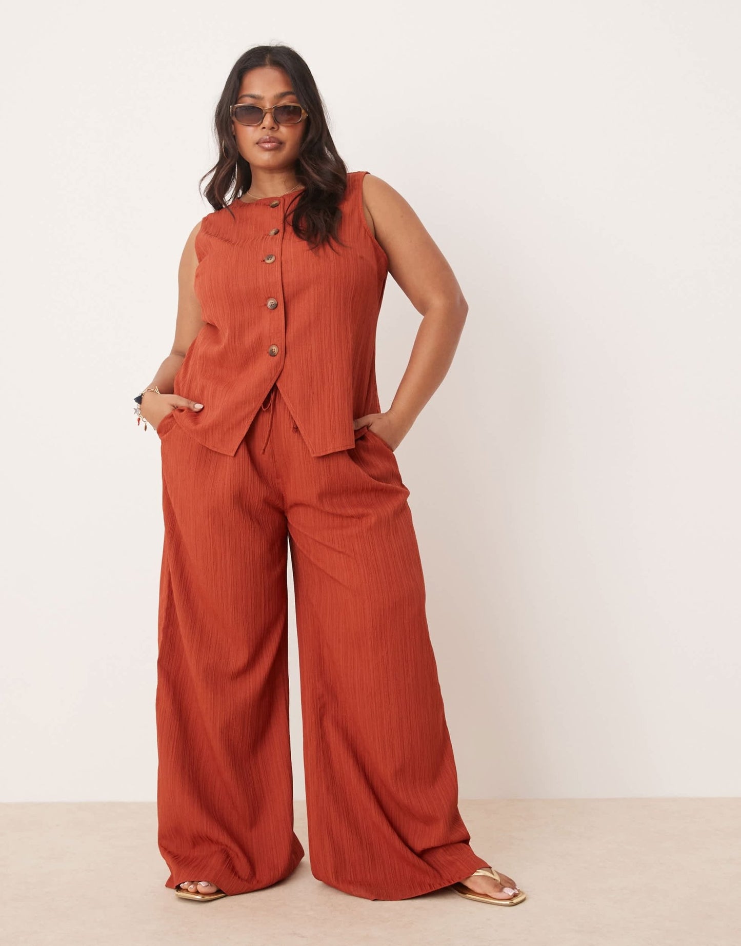 ASOS DESIGN Curve crinkle palazzo trousers co-ord in rust - ASOS Sample Sale