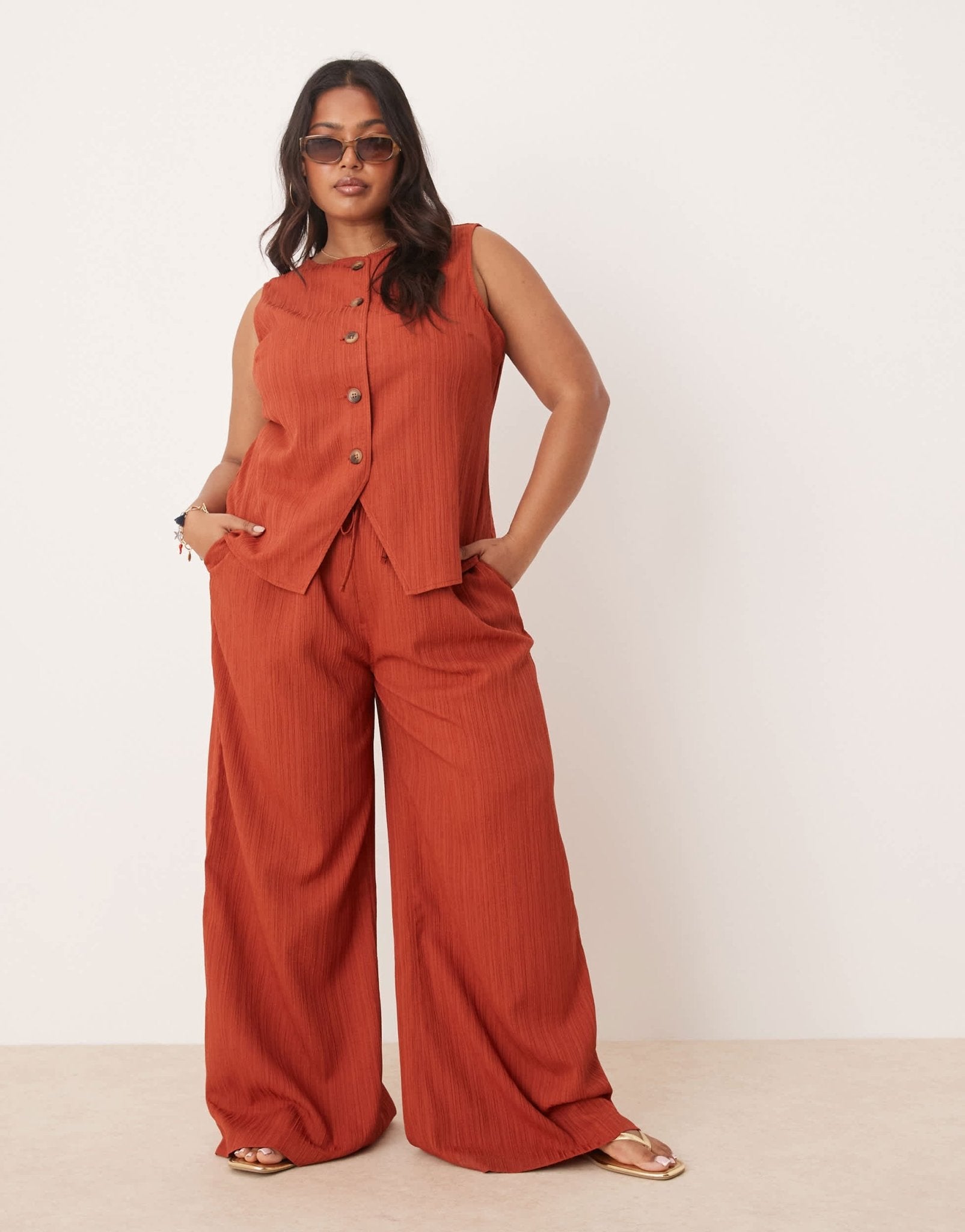 ASOS DESIGN Curve crinkle palazzo trousers co-ord in rust - ASOS Sample Sale