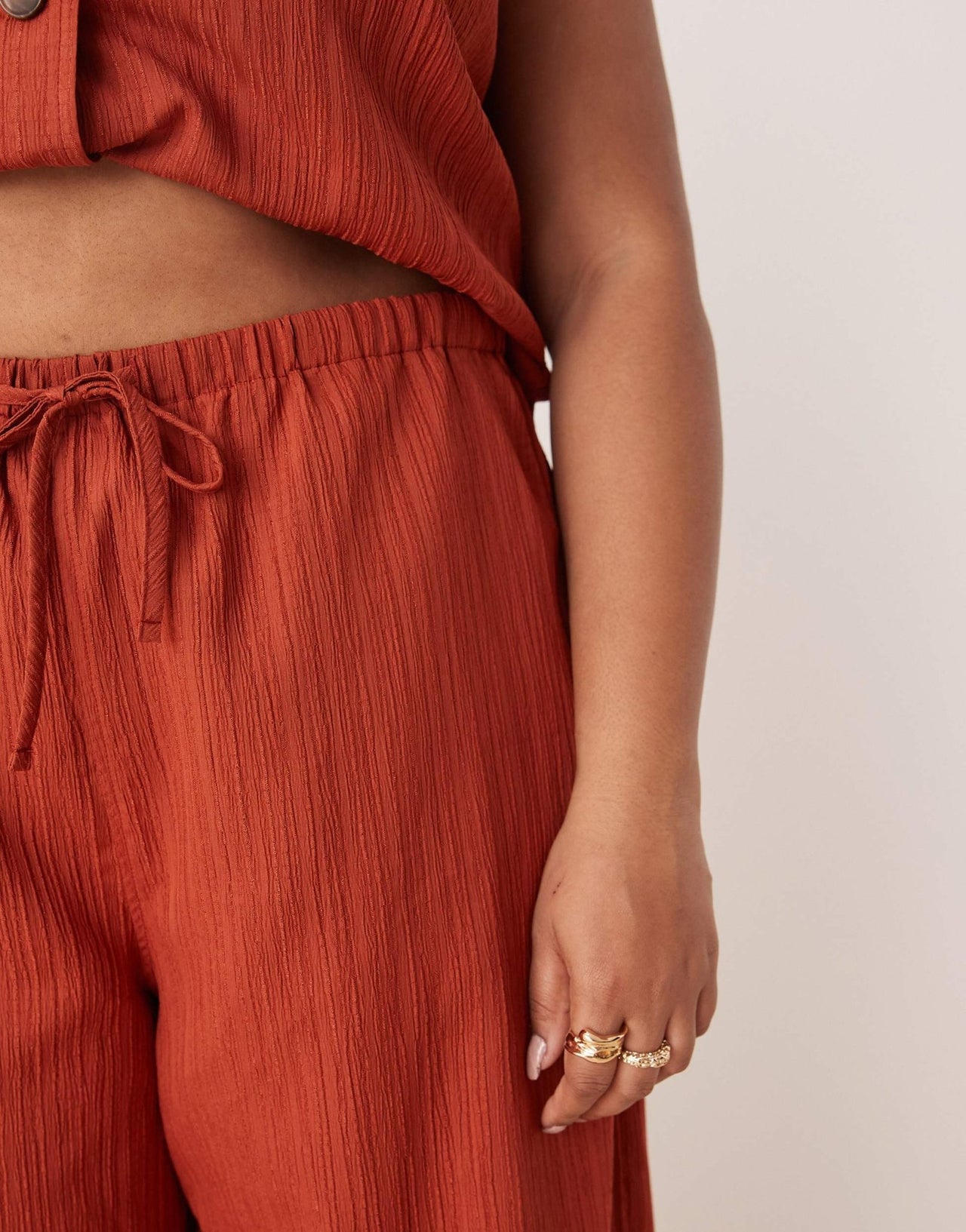 ASOS DESIGN Curve crinkle palazzo trousers co-ord in rust - ASOS Sample Sale