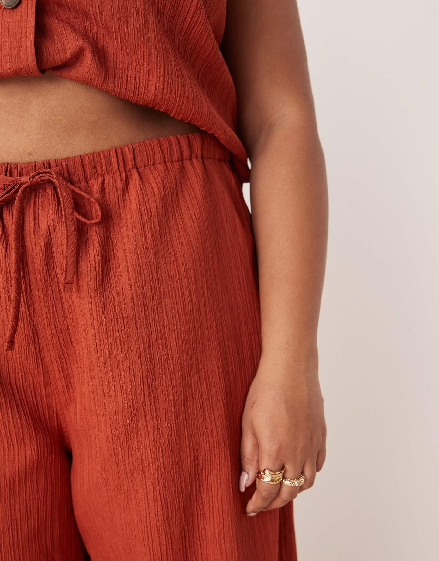 ASOS DESIGN Curve crinkle palazzo trousers co-ord in rust - ASOS Sample Sale
