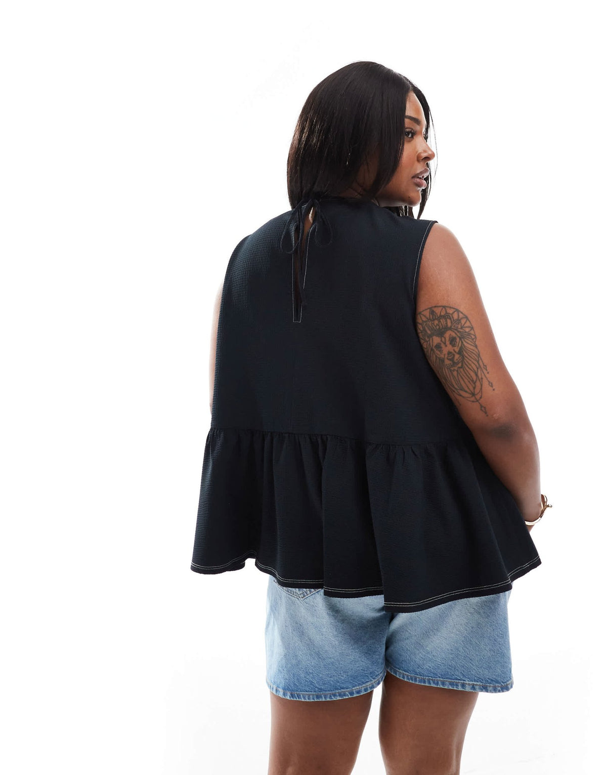 ASOS DESIGN Curve sleeveless peplum top with tie back in black - ASOS Sample Sale