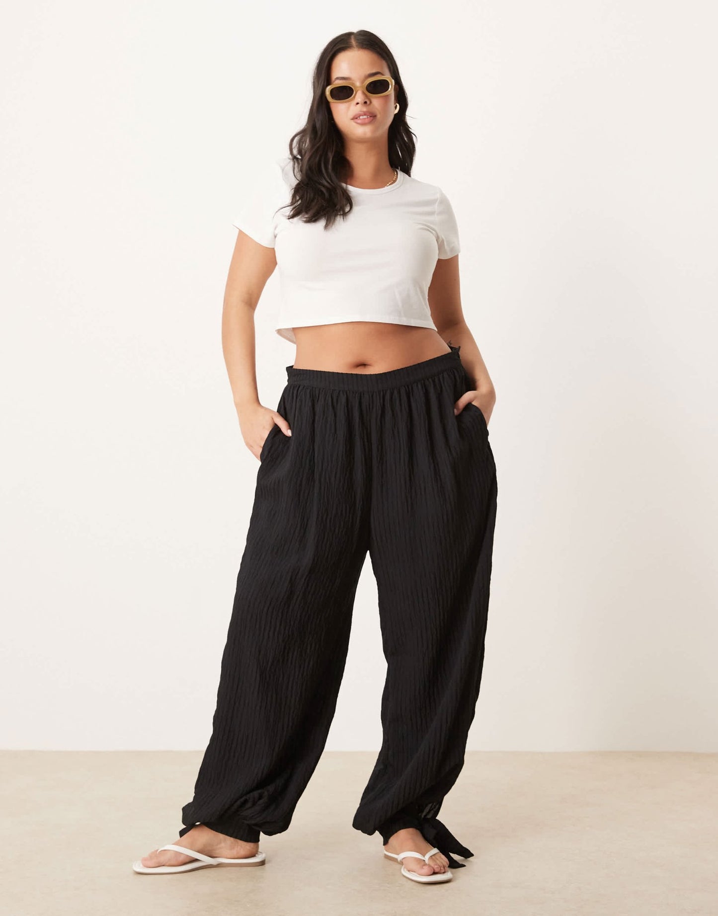 ASOS DESIGN Curve textured stripe billow trousers with cuff detail in black - ASOS Sample Sale
