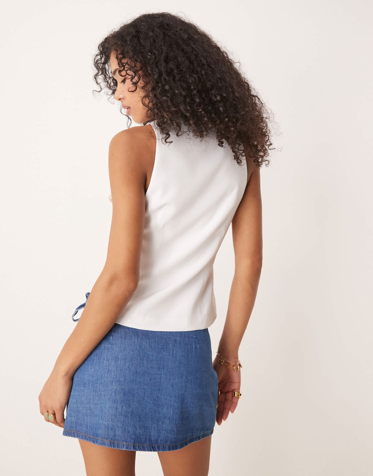 ASOS DESIGN denim wrap front mini skirt with bow detail in mid blue - ASOS Sample Sale