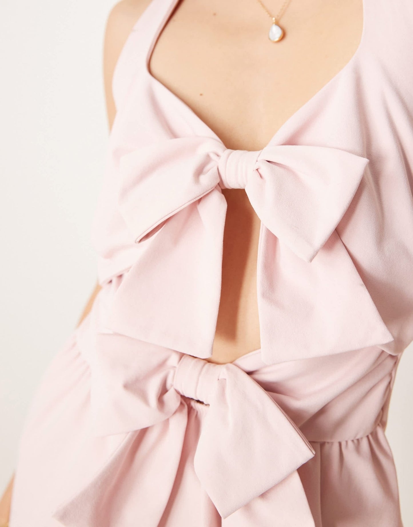 ASOS DESIGN double bow front halter mini dress in baby pink - ASOS Sample Sale