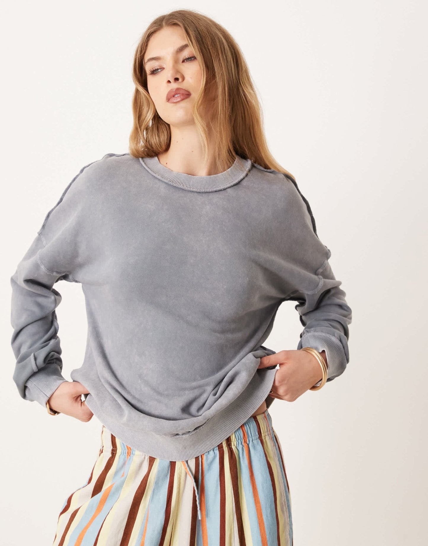 ASOS DESIGN exposed seam brushback twist back sweat in washed blue - ASOS Sample Sale