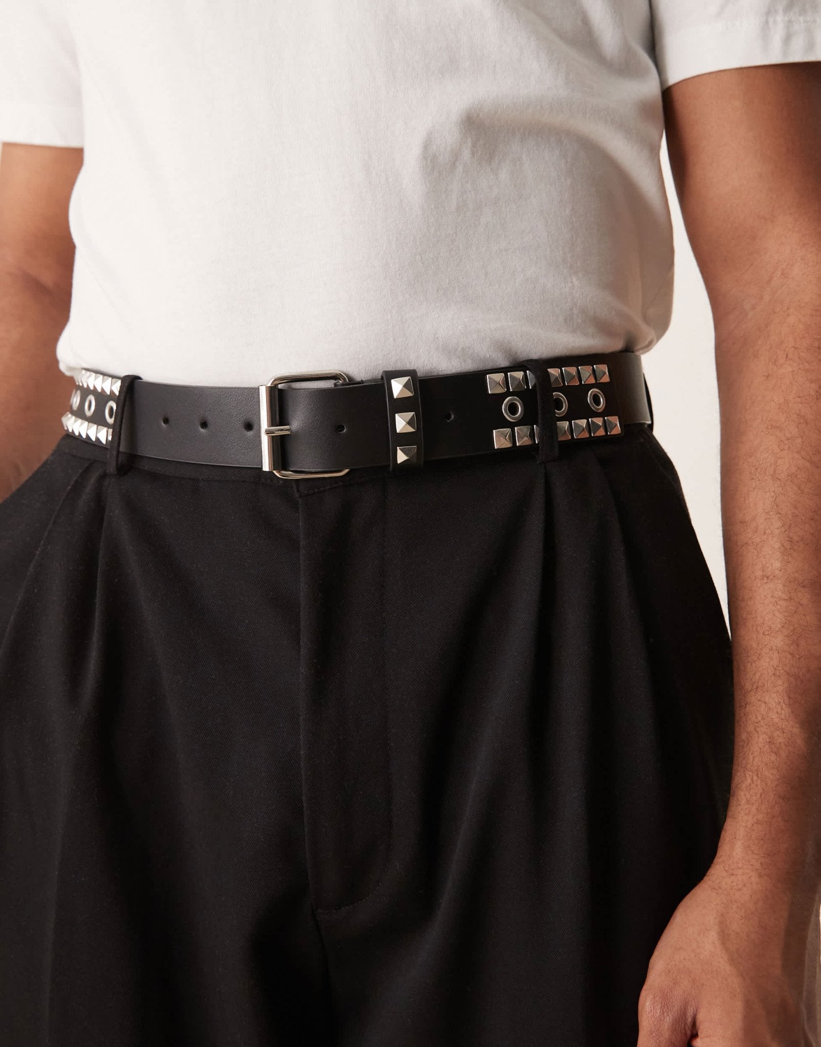 ASOS DESIGN eyelet belt with studding in black faux leather - ASOS Sample Sale