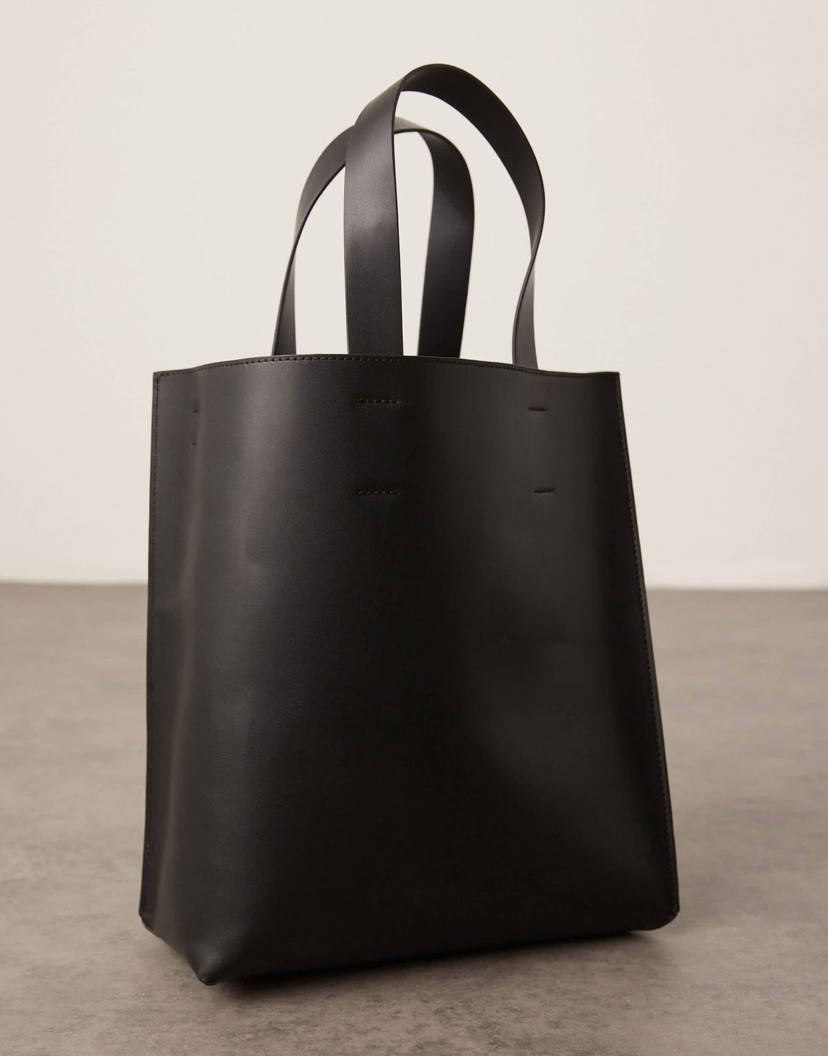ASOS DESIGN faux leather tote bag with crossbody strap in black - ASOS Sample Sale