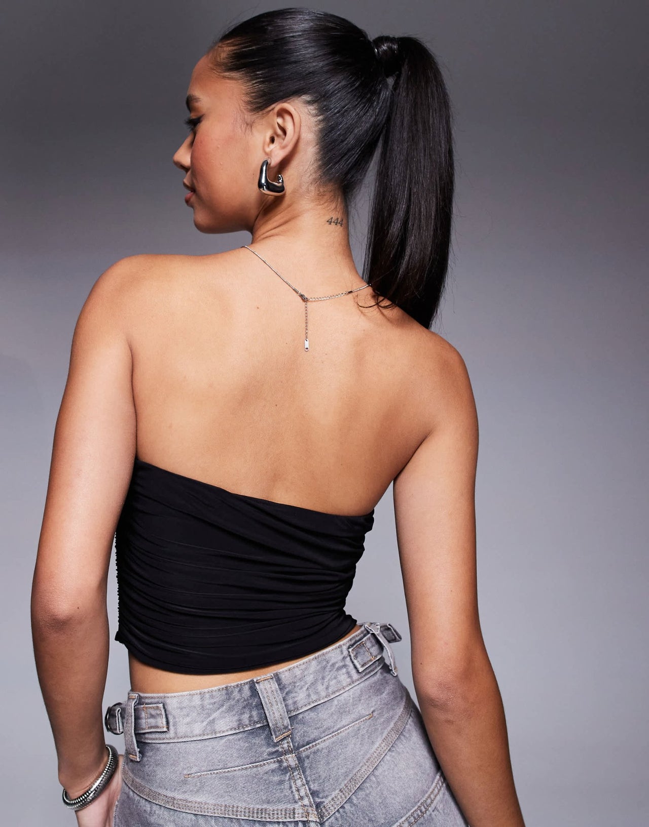 ASOS DESIGN gold detail ruched cut out bandeau top in black - ASOS Sample Sale