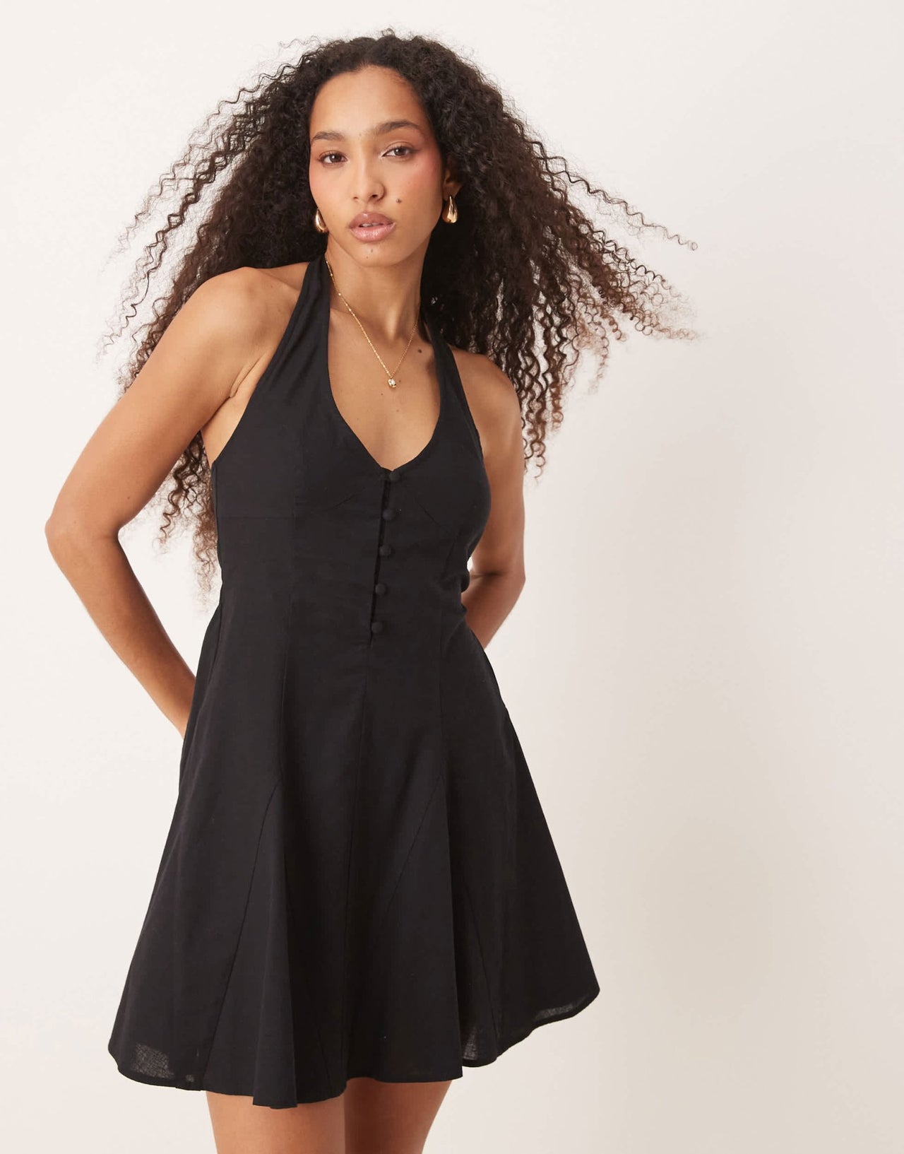 ASOS DESIGN halter mini sundress with godet hem in black - ASOS Sample Sale