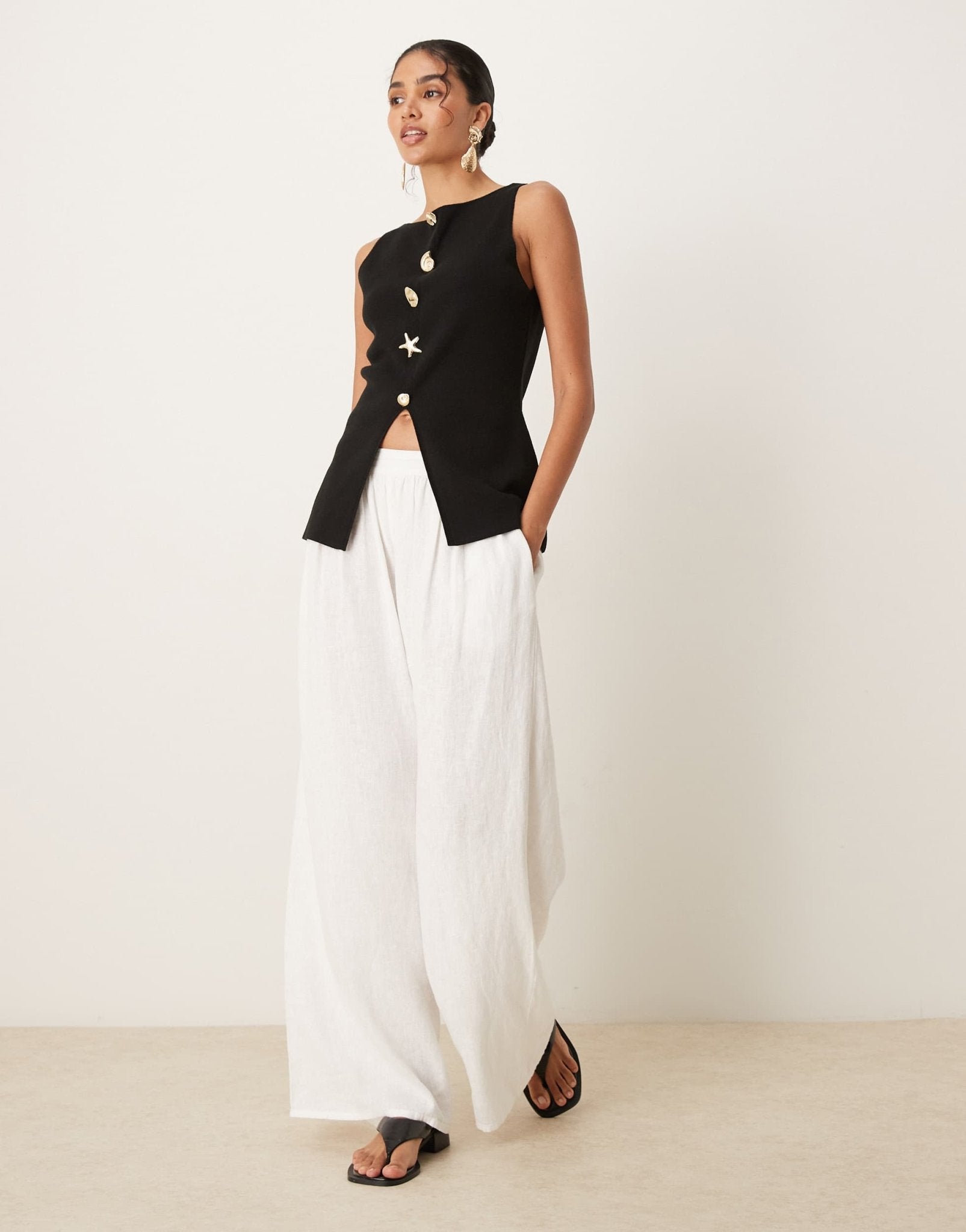 ASOS DESIGN knitted slash neck multi button waistcoat in black - ASOS Sample Sale