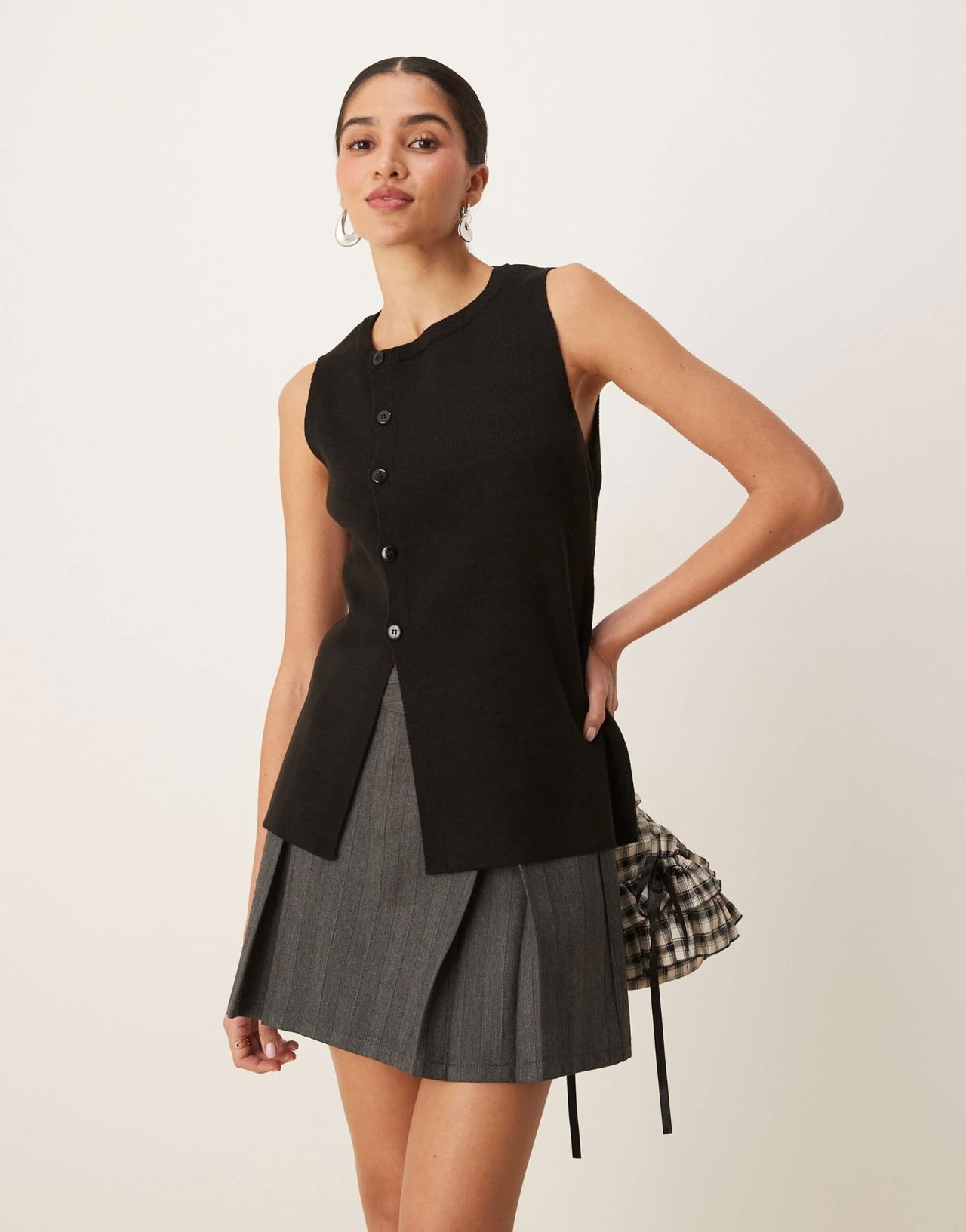 ASOS DESIGN knitted structured asymmetric button front waistcoat with split in black - ASOS Sample Sale