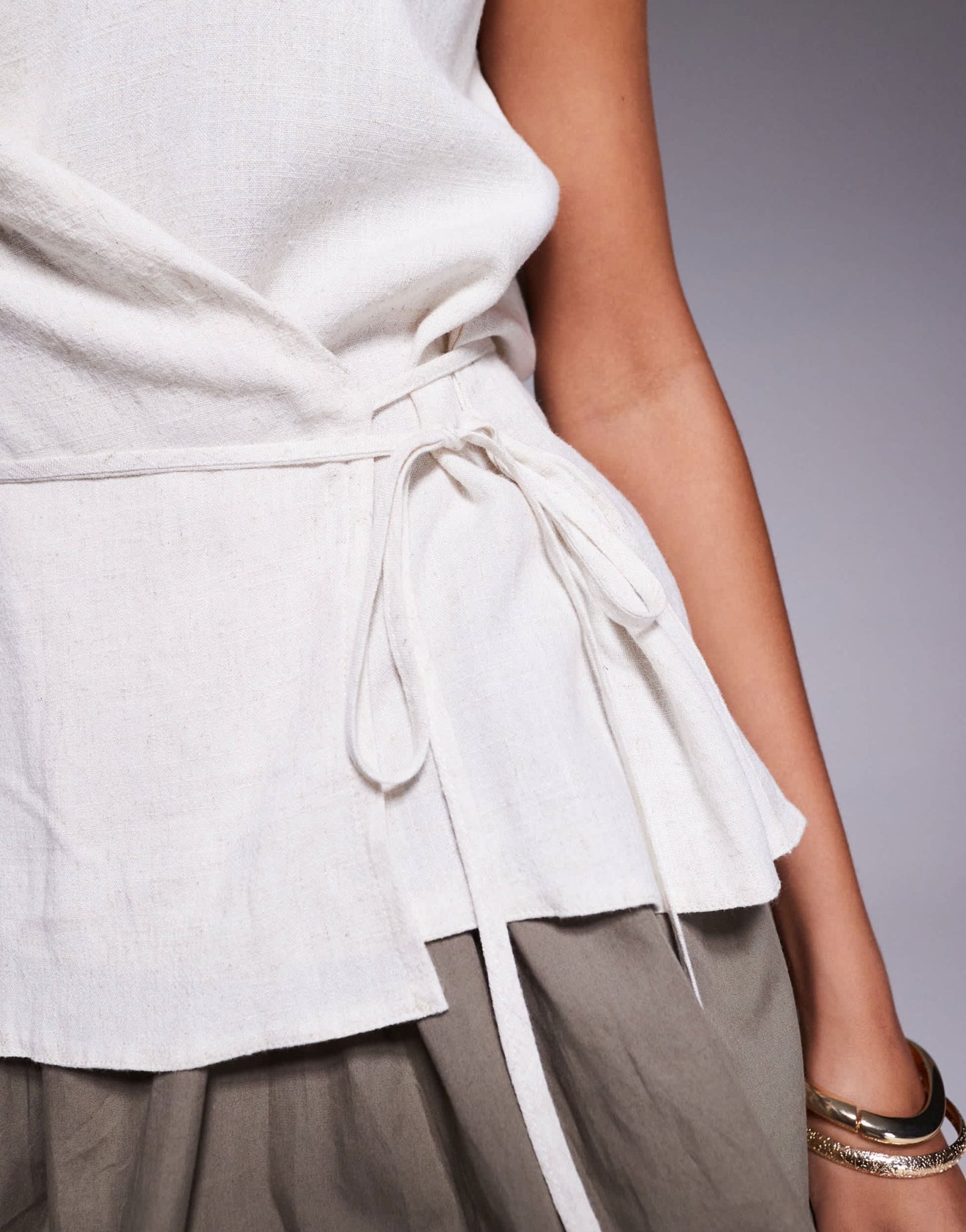 ASOS DESIGN linen look wrap over sleeveless blouse in cream - ASOS Sample Sale
