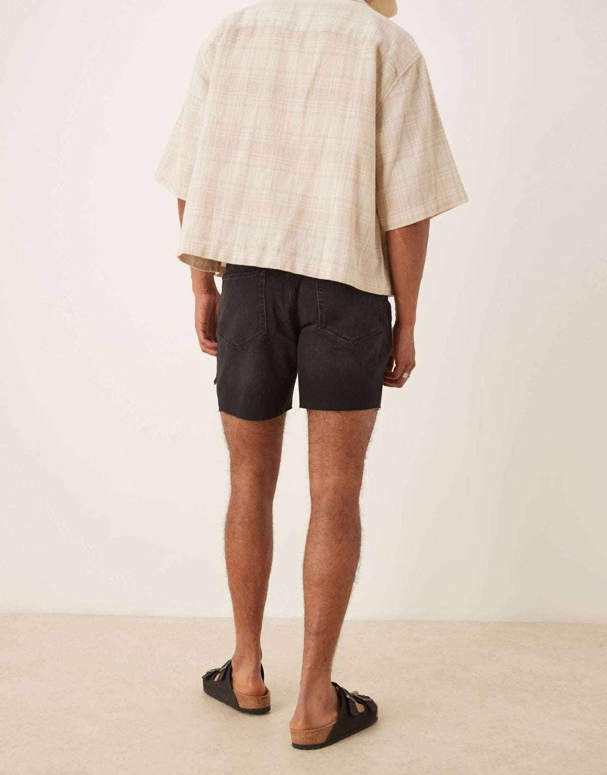 ASOS DESIGN mid length slim denim shorts with rips in black - ASOS Sample Sale