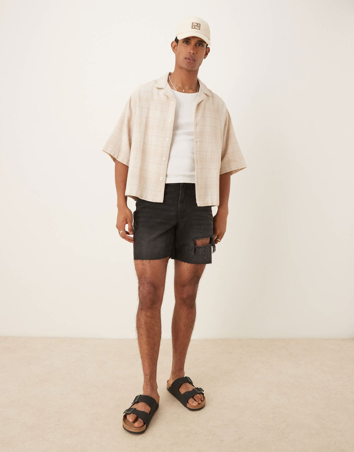 ASOS DESIGN mid length slim denim shorts with rips in black - ASOS Sample Sale