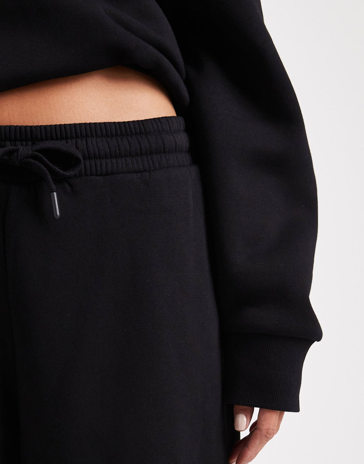 ASOS DESIGN oversized brushback jogger with turnback hem detail in black - ASOS Sample Sale