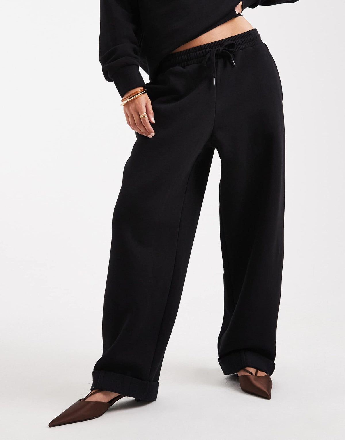 ASOS DESIGN oversized brushback jogger with turnback hem detail in black - ASOS Sample Sale