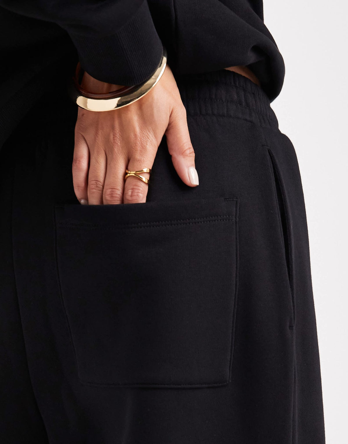 ASOS DESIGN oversized brushback jogger with turnback hem detail in black - ASOS Sample Sale