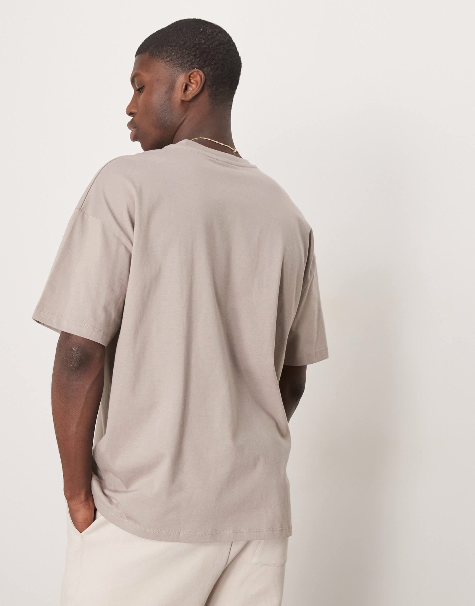 ASOS DESIGN oversized dropped shoulder t-shirt with city chest applique in brown - ASOS Sample Sale