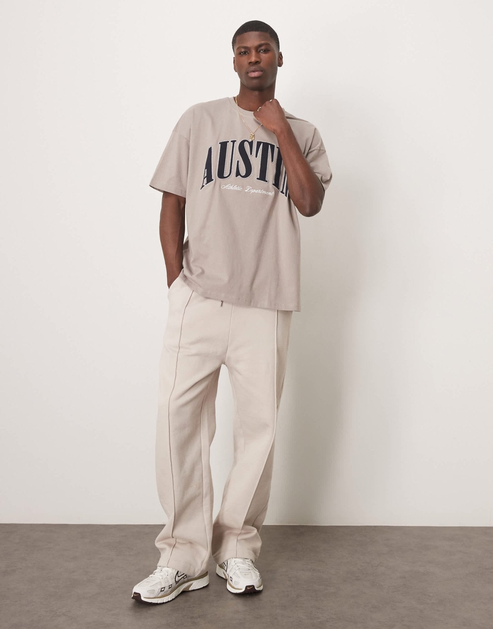 ASOS DESIGN oversized dropped shoulder t-shirt with city chest applique in brown - ASOS Sample Sale