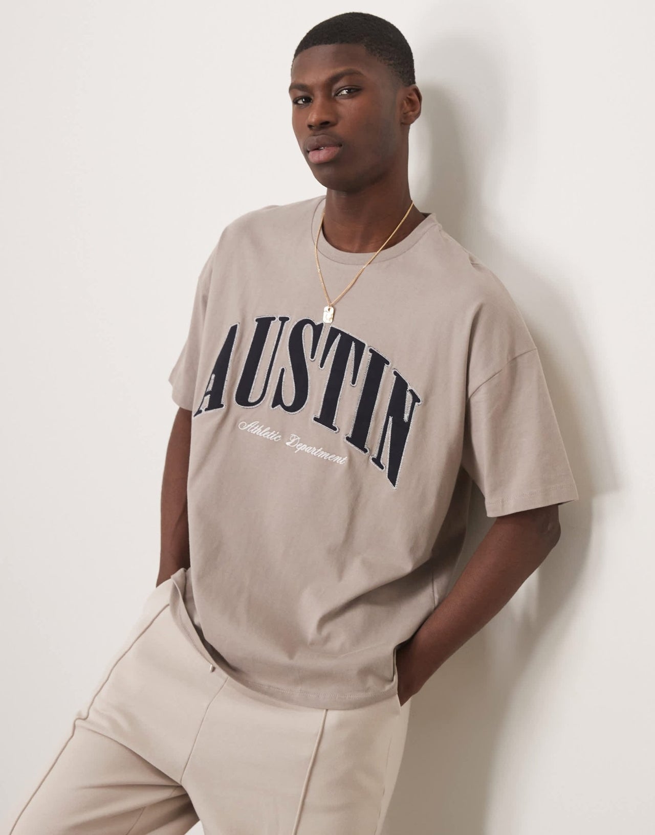 ASOS DESIGN oversized dropped shoulder t-shirt with city chest applique in brown - ASOS Sample Sale