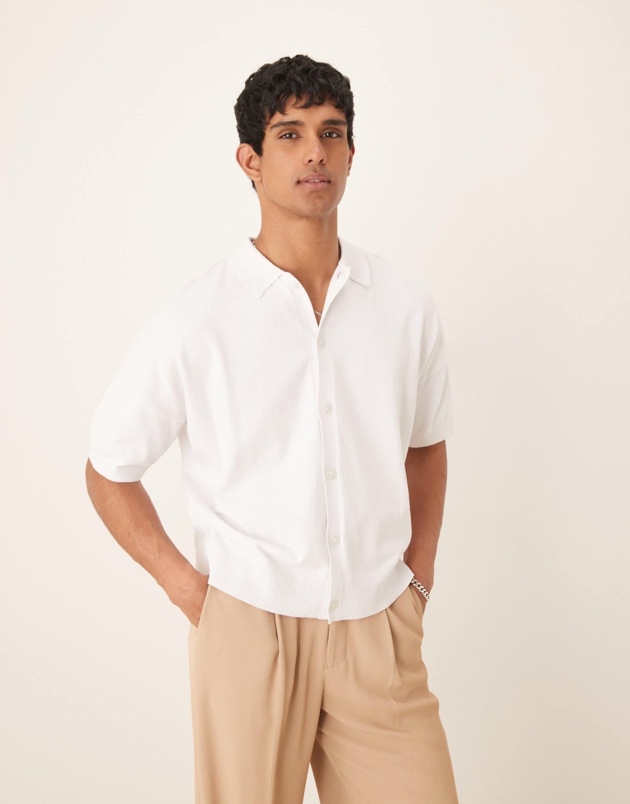 ASOS DESIGN oversized knitted cotton button through polo in white - ASOS Sample Sale
