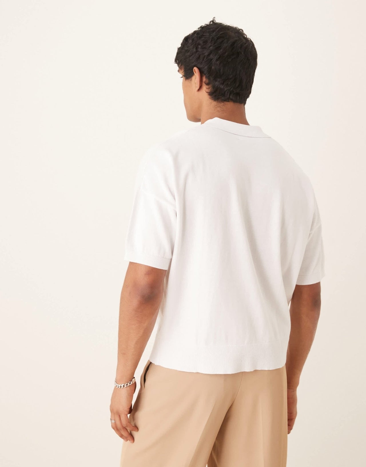 ASOS DESIGN oversized knitted cotton button through polo in white - ASOS Sample Sale