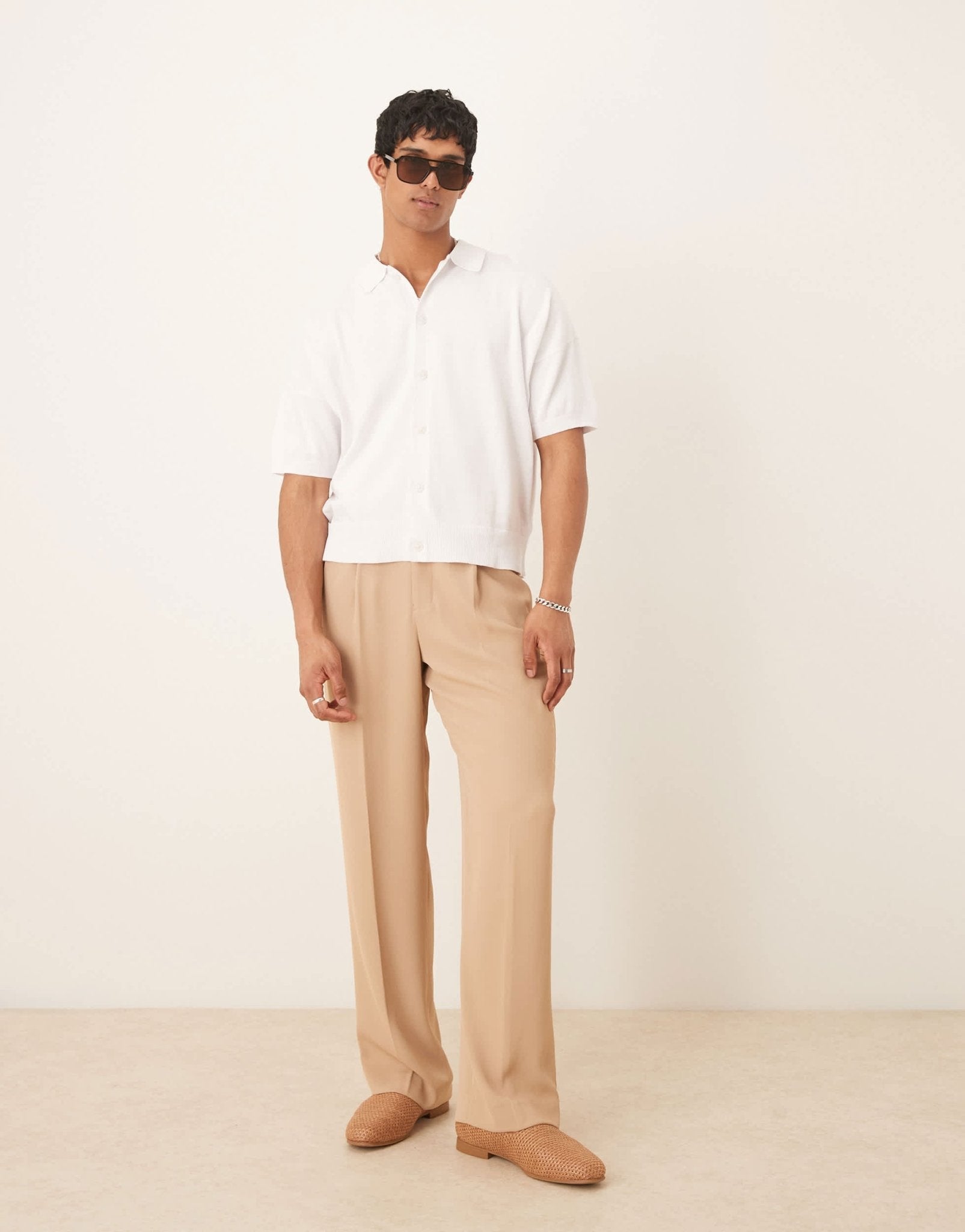 ASOS DESIGN oversized knitted cotton button through polo in white - ASOS Sample Sale