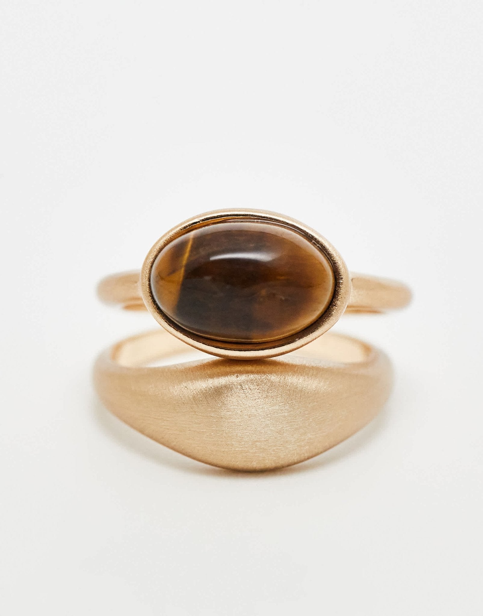 ASOS DESIGN pack of 2 stone set rings with real tigers eye in brushed gold tone - ASOS Sample Sale