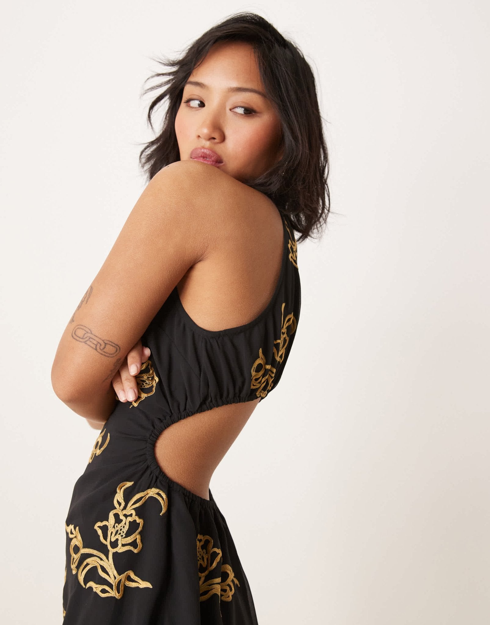 ASOS DESIGN petite all over floral embroidered halter mini dress with open back in black - ASOS Sample Sale