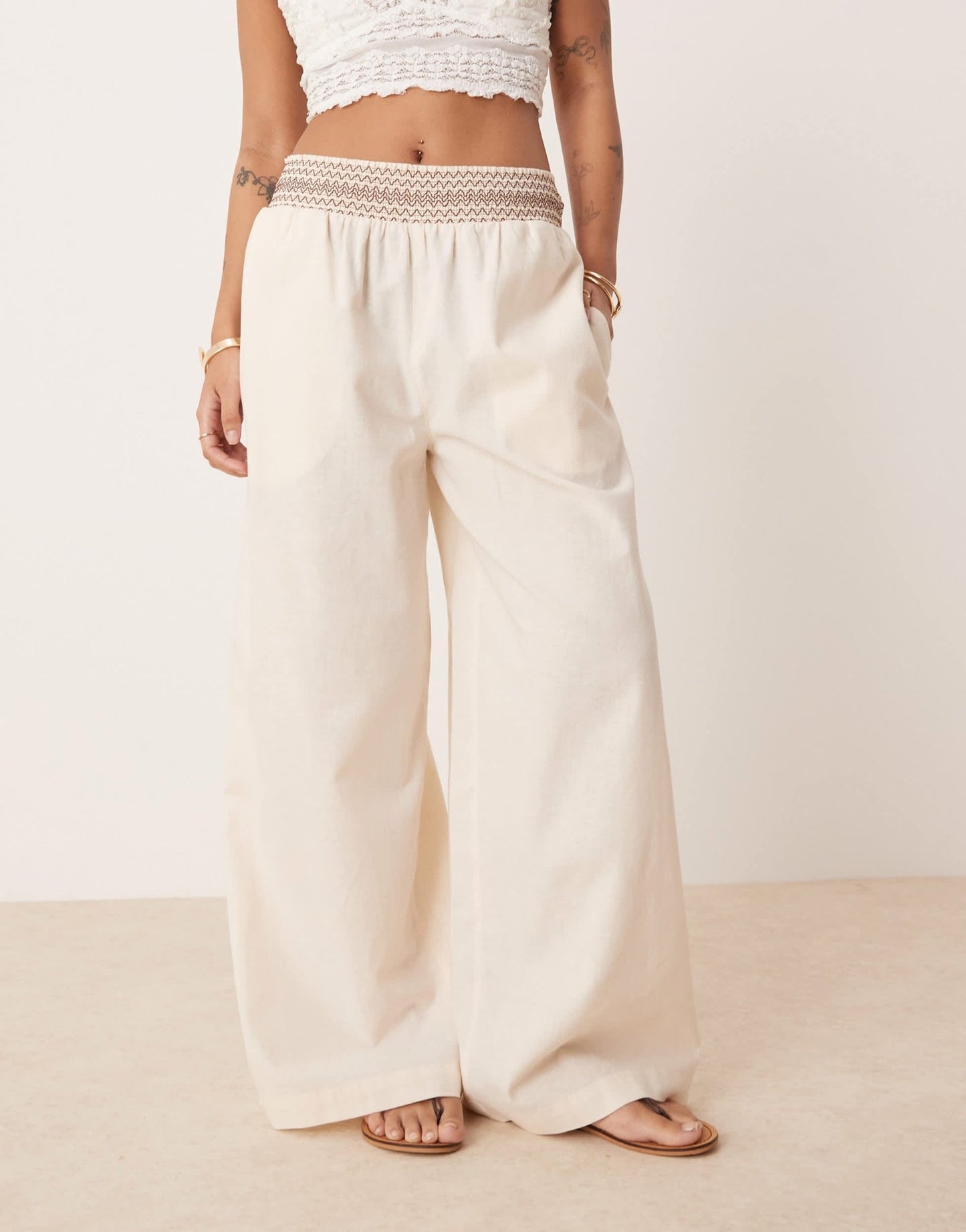 ASOS DESIGN Petite linen blend pull on wide leg trousers with shirred waist detail in cream with brown - ASOS Sample Sale