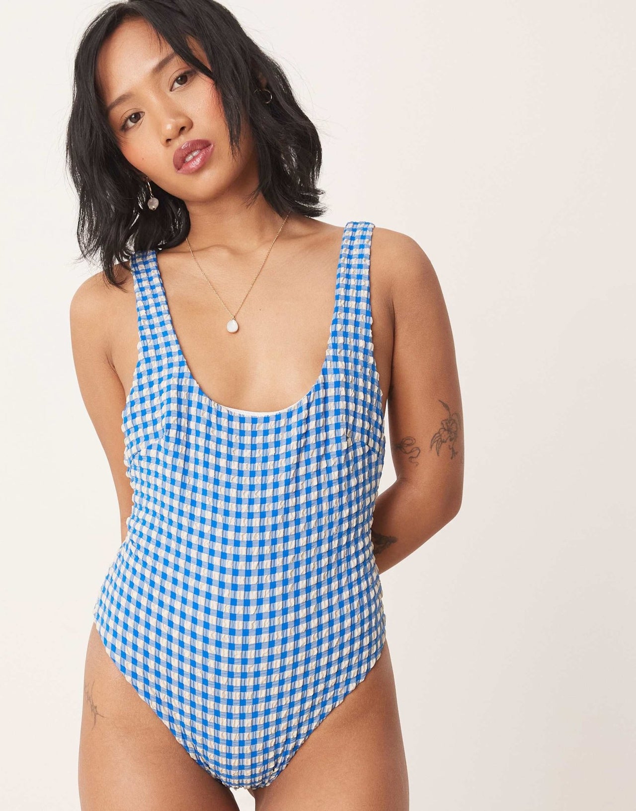 ASOS DESIGN Petite seersucker scoop swimsuit with giant bow back detail in blue gingham - ASOS Sample Sale