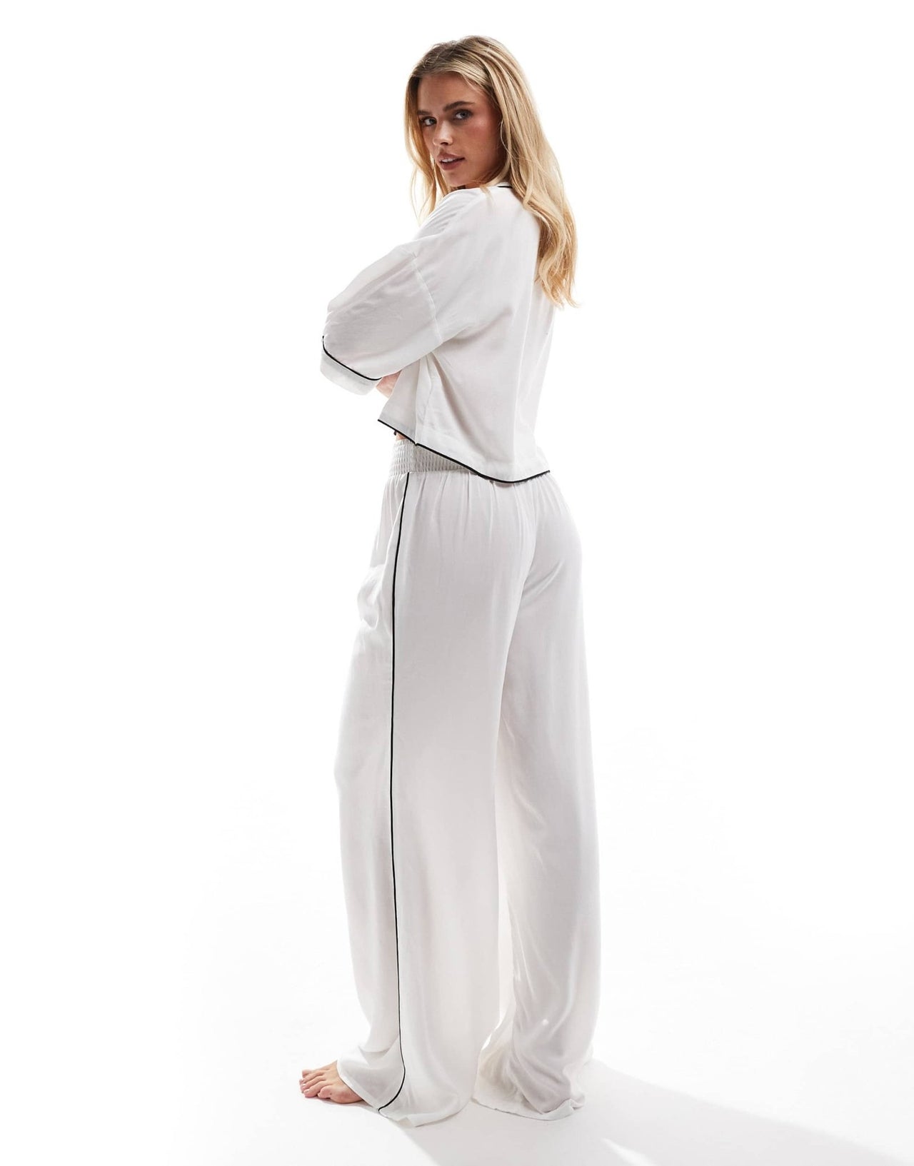 ASOS DESIGN Petite super soft slinky wide leg pyjama trouser in white with contrast binding - ASOS Sample Sale