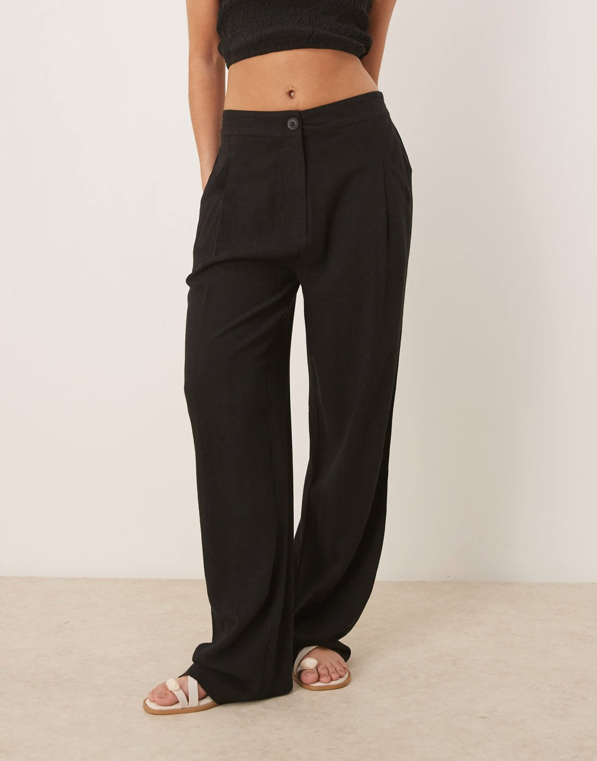 ASOS DESIGN pleat front tapered trousers with linen in black - ASOS Sample Sale