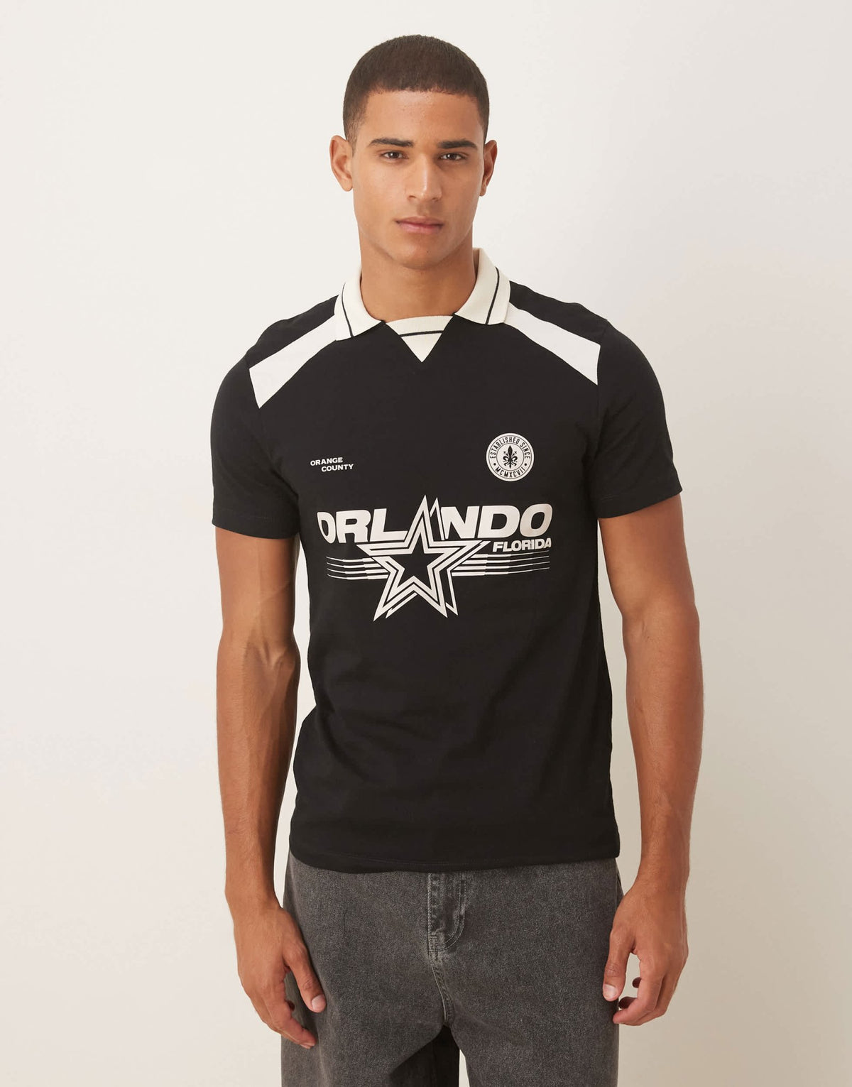 ASOS DESIGN polo with city graphic in black - ASOS Sample Sale
