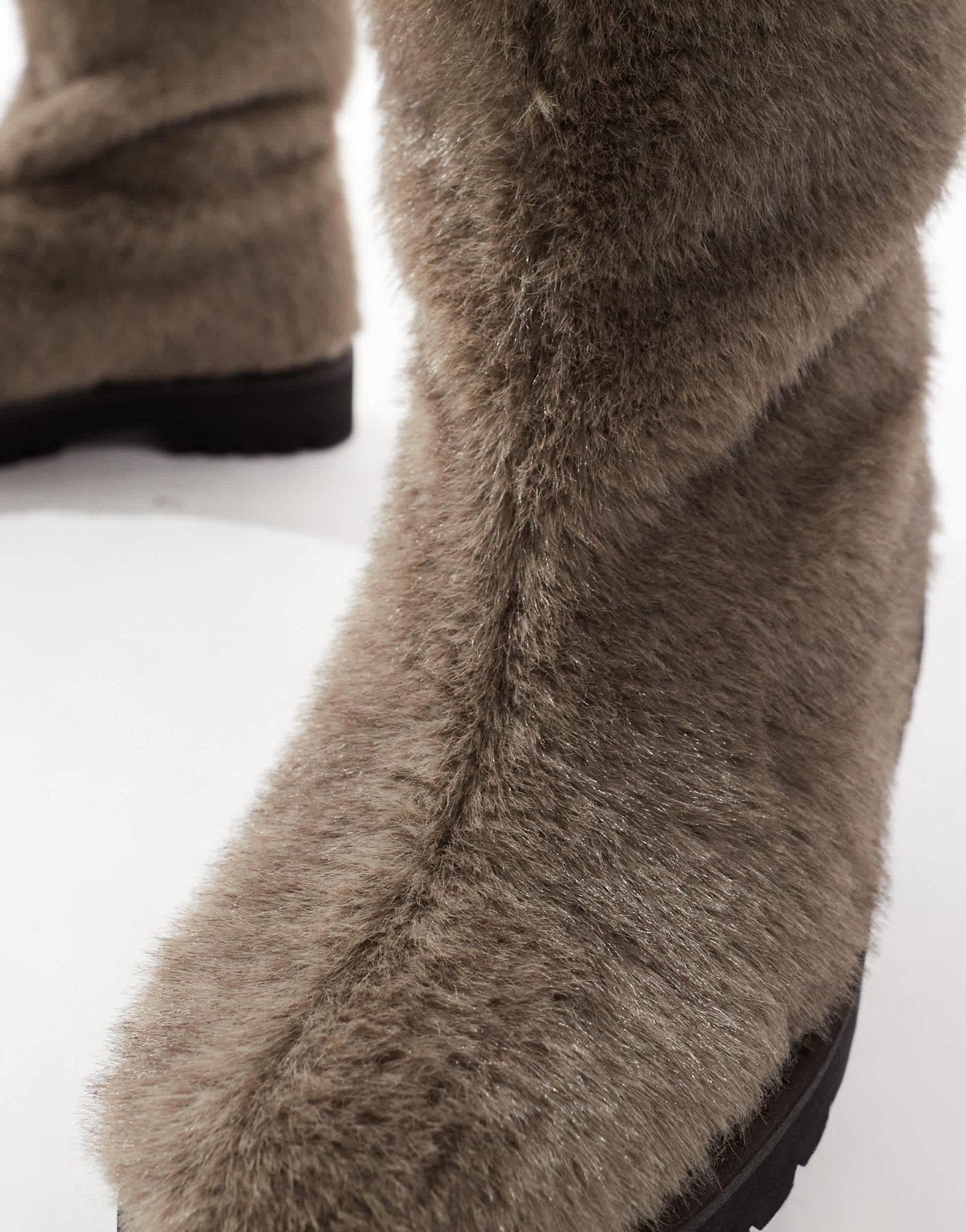 ASOS DESIGN pull on boots in brown faux fur - ASOS Sample Sale