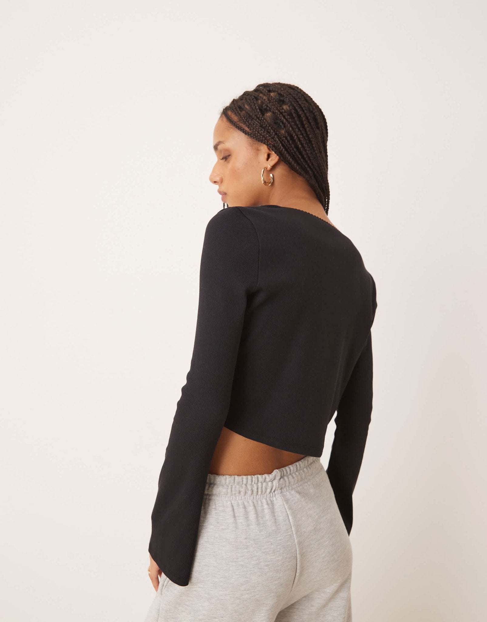ASOS DESIGN ribbed long sleeve boxy crop top with trim detail in black - ASOS Sample Sale