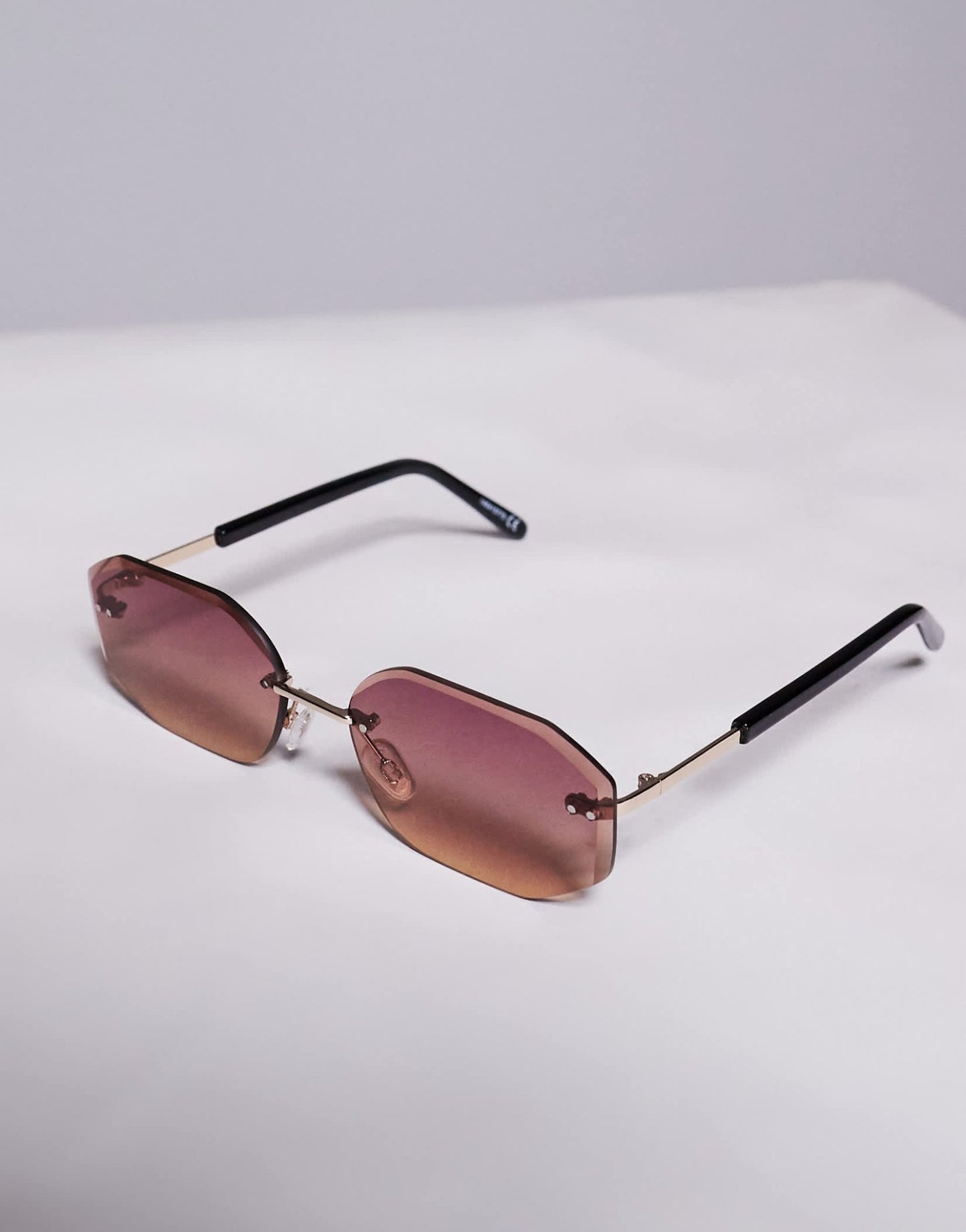 ASOS DESIGN rimless sunglasses with purple lens and metal gold frame - ASOS Sample Sale