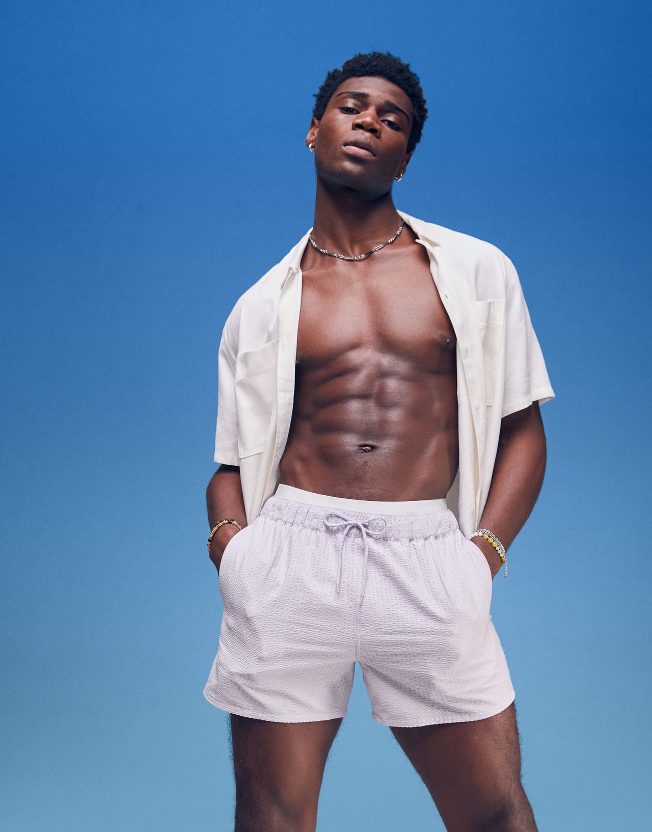 ASOS DESIGN seersucker swim shorts in short length in purple - ASOS Sample Sale