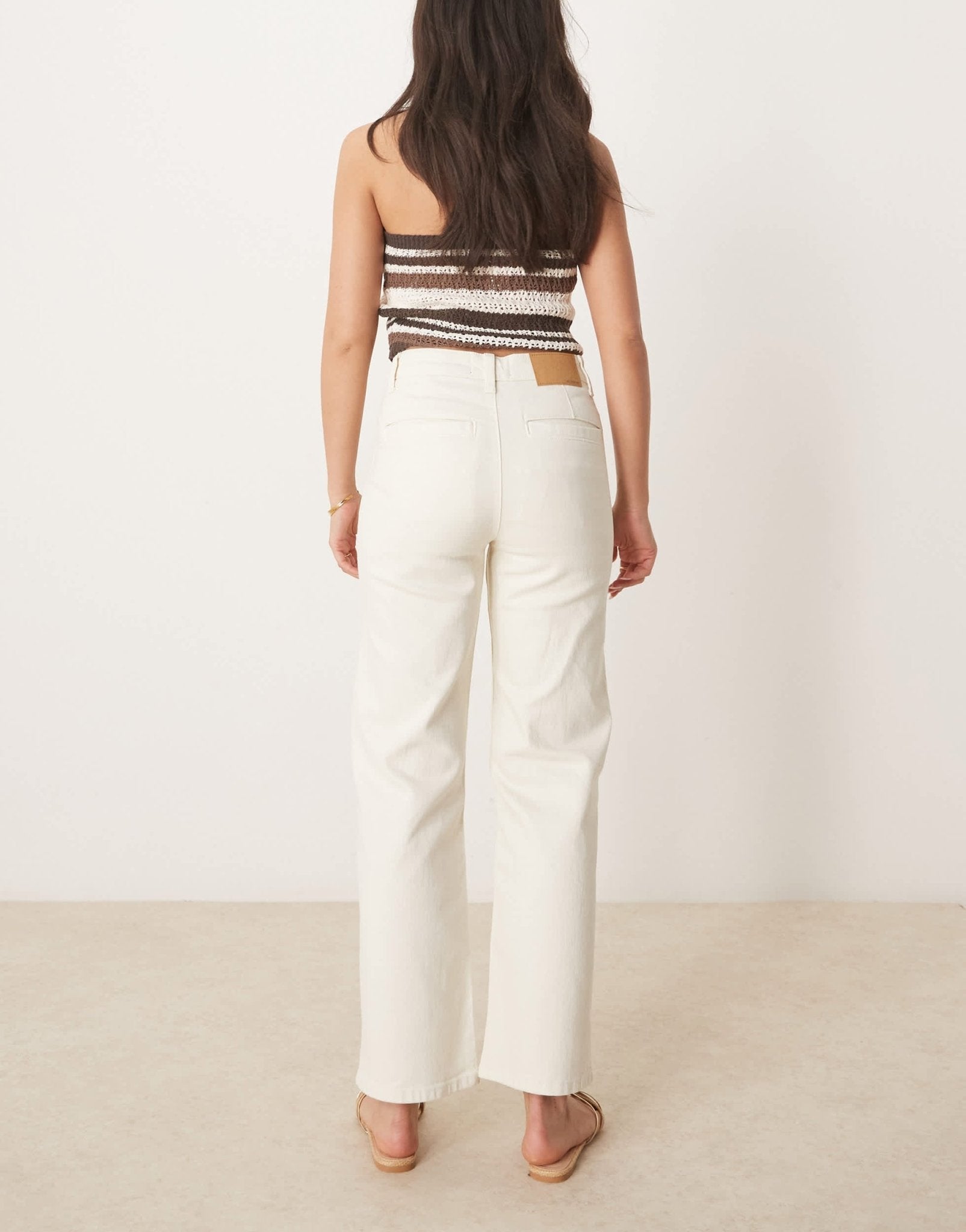 ASOS DESIGN straight leg jeans with button placket in white - ASOS Sample Sale