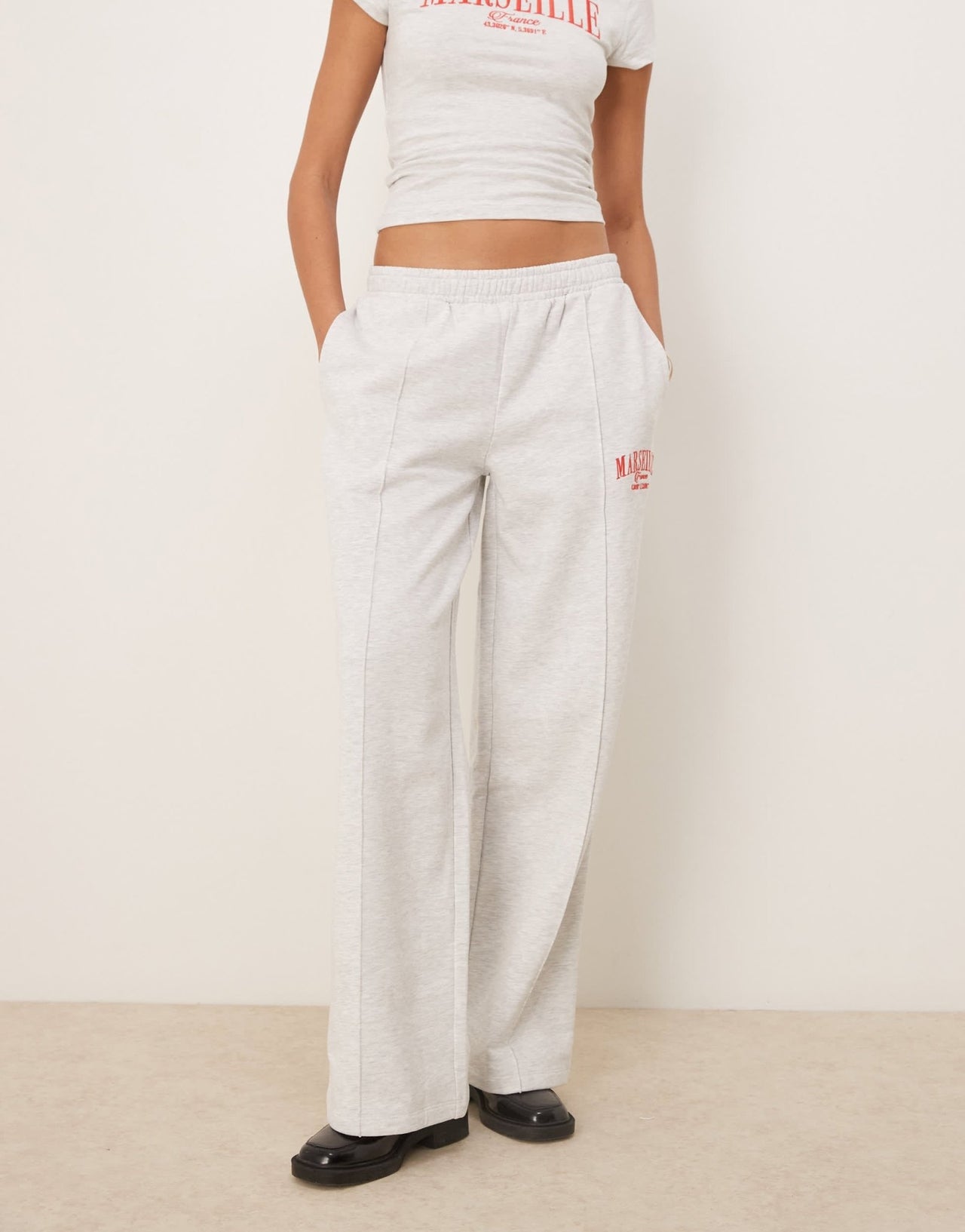 ASOS DESIGN straight leg jogger with Marseille embroidered graphic in ice marl - ASOS Sample Sale