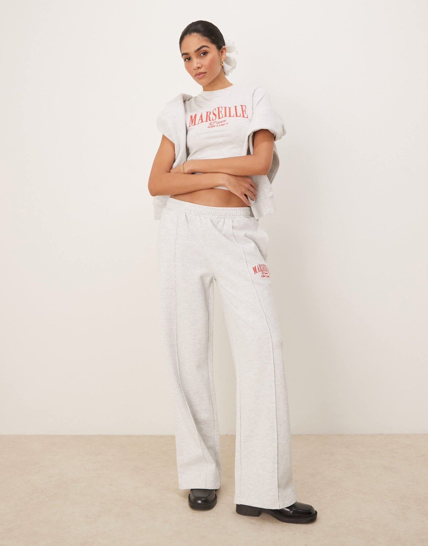 ASOS DESIGN straight leg jogger with Marseille embroidered graphic in ice marl - ASOS Sample Sale