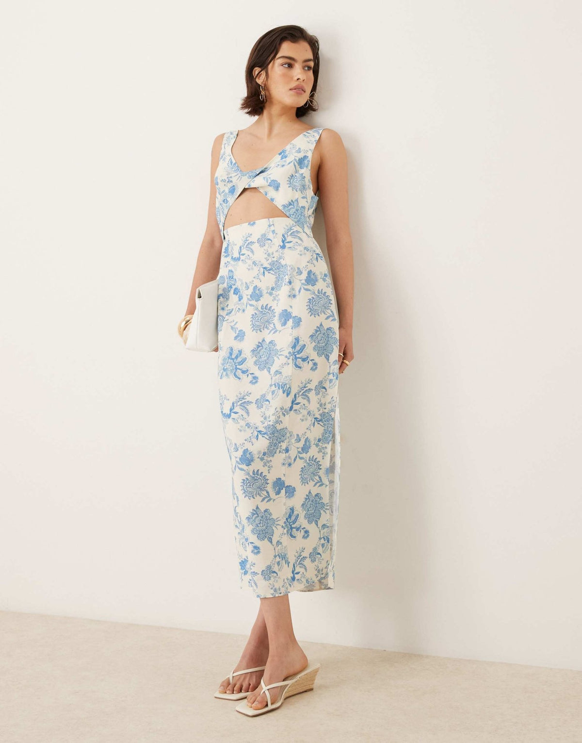 ASOS DESIGN strappy twist bust detail cut out midi dress in floral print - ASOS Sample Sale