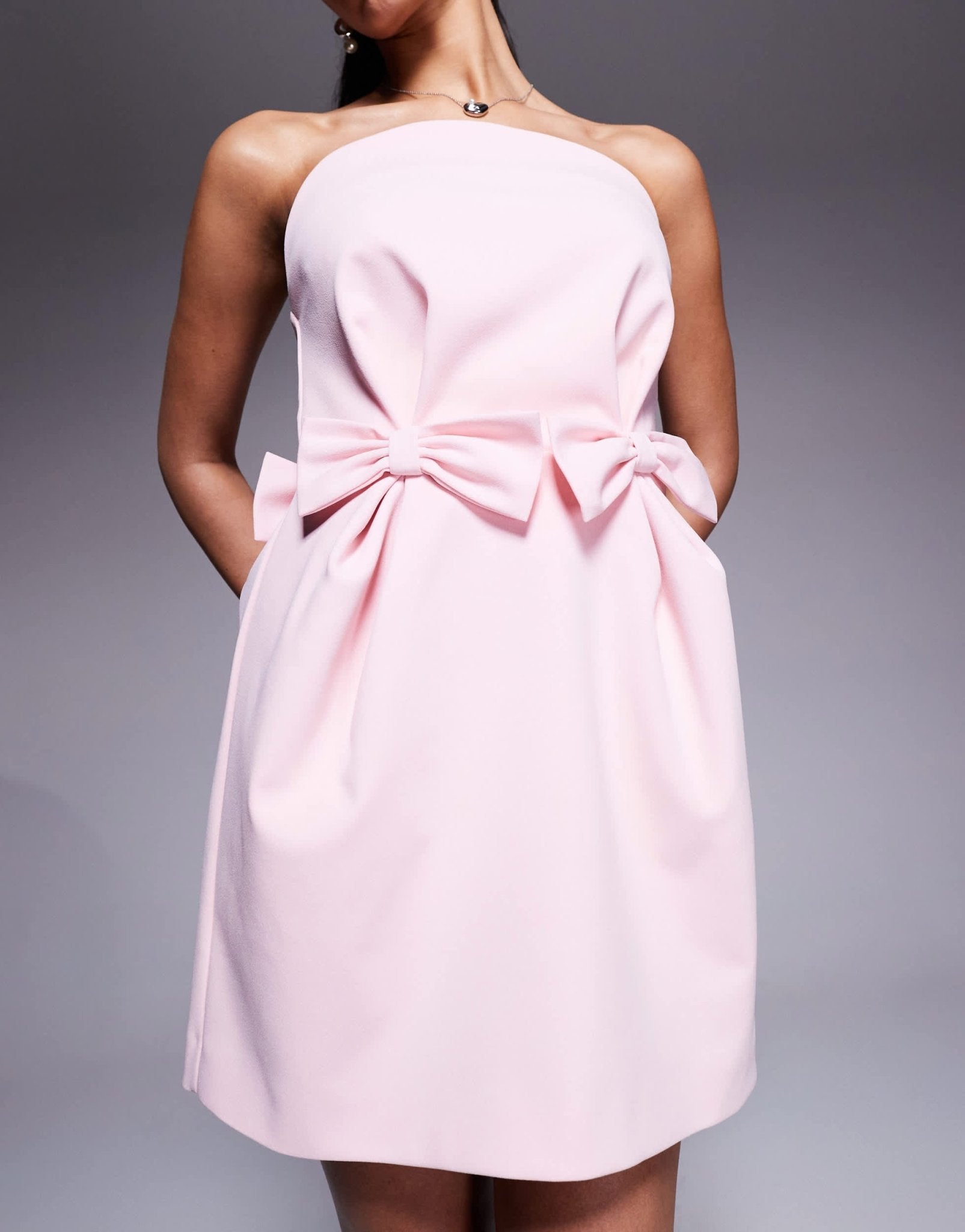 ASOS DESIGN structured curved bodice bow mini dress in pale pink - ASOS Sample Sale