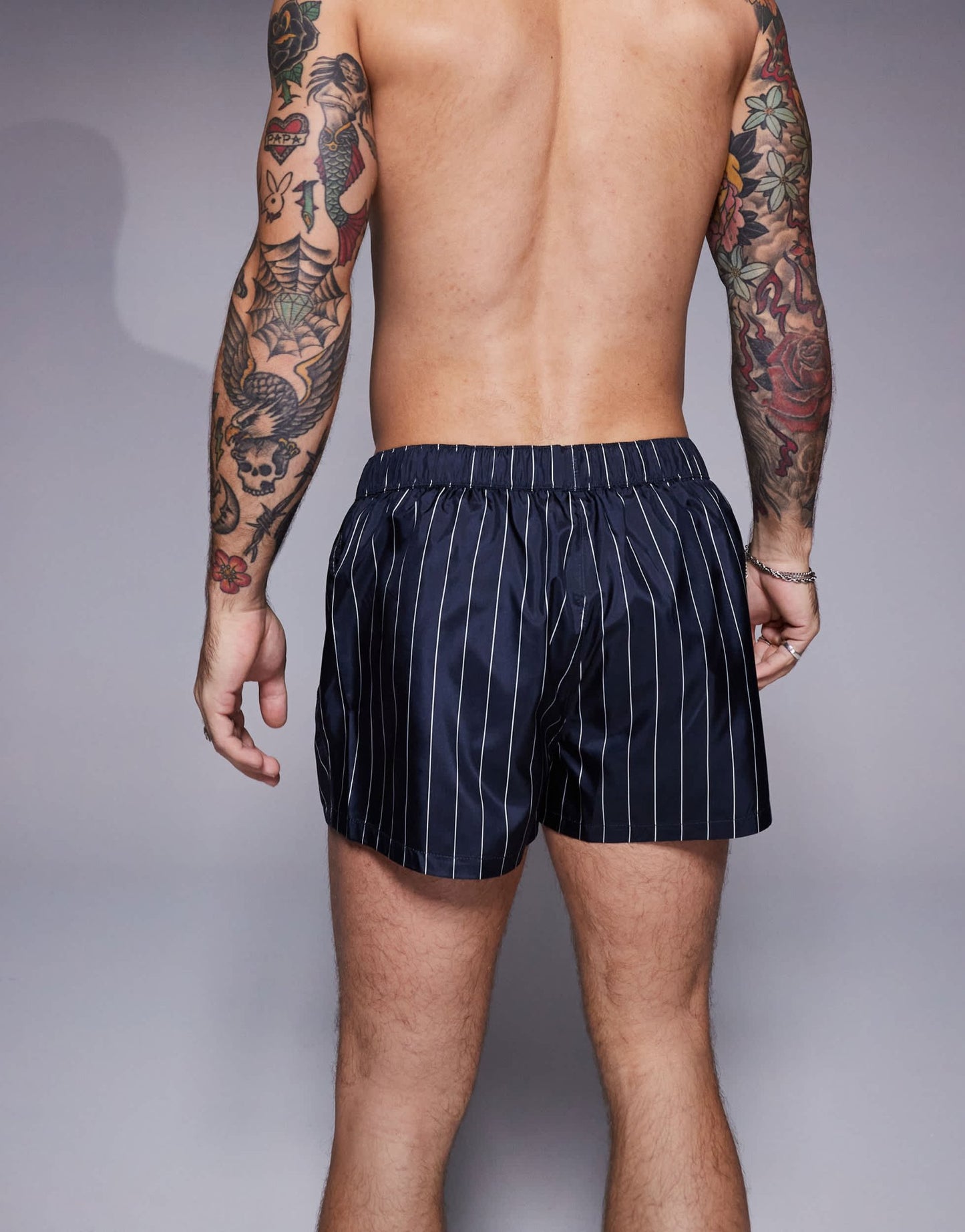 ASOS DESIGN swim short in super short length in navy and white pin stripe - ASOS Sample Sale