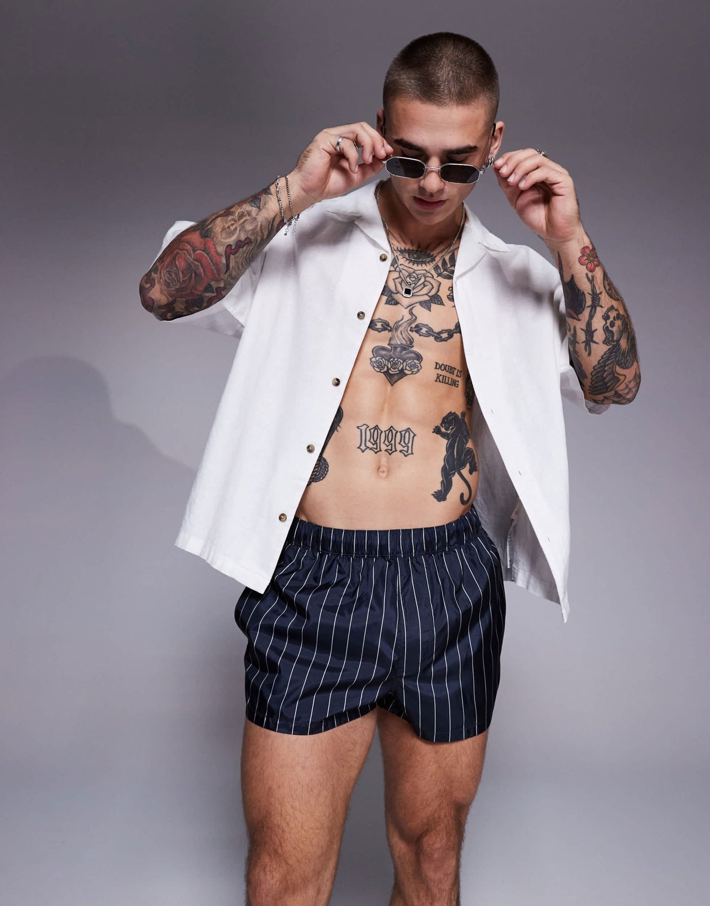 ASOS DESIGN swim short in super short length in navy and white pin stripe - ASOS Sample Sale
