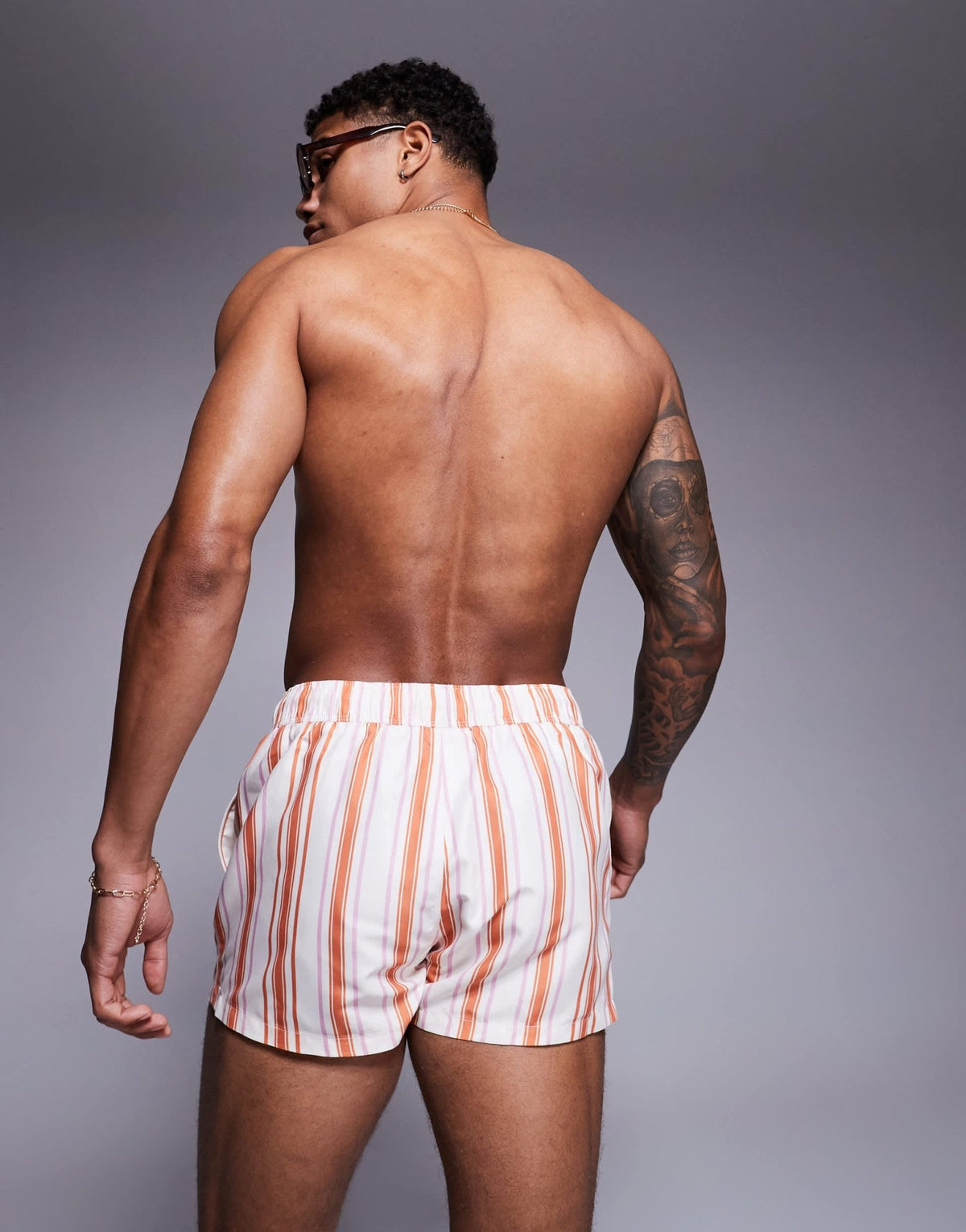 ASOS DESIGN swim short in super short length in white and orange stripe - ASOS Sample Sale