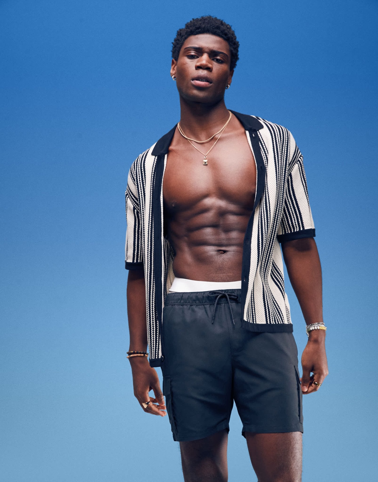 ASOS DESIGN swim shorts in mid length with cargo pockets in black - ASOS Sample Sale