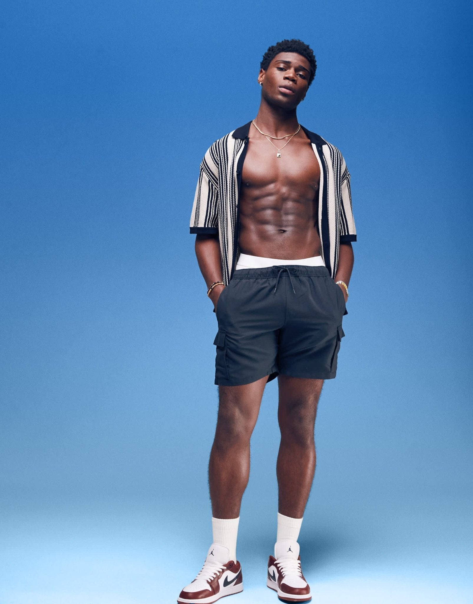 ASOS DESIGN swim shorts in mid length with cargo pockets in black - ASOS Sample Sale