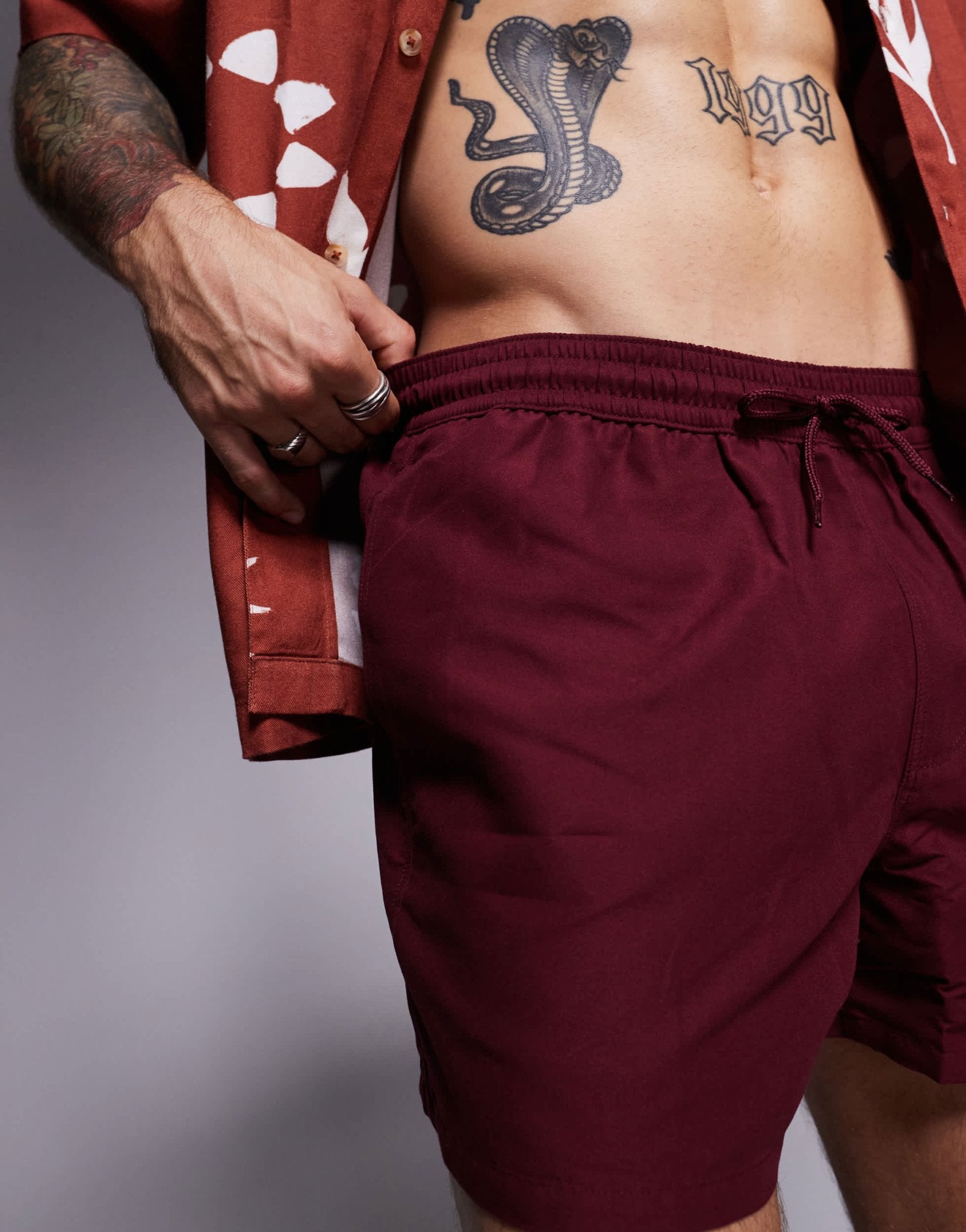 ASOS DESIGN swim shorts in short length in burgundy - ASOS Sample Sale