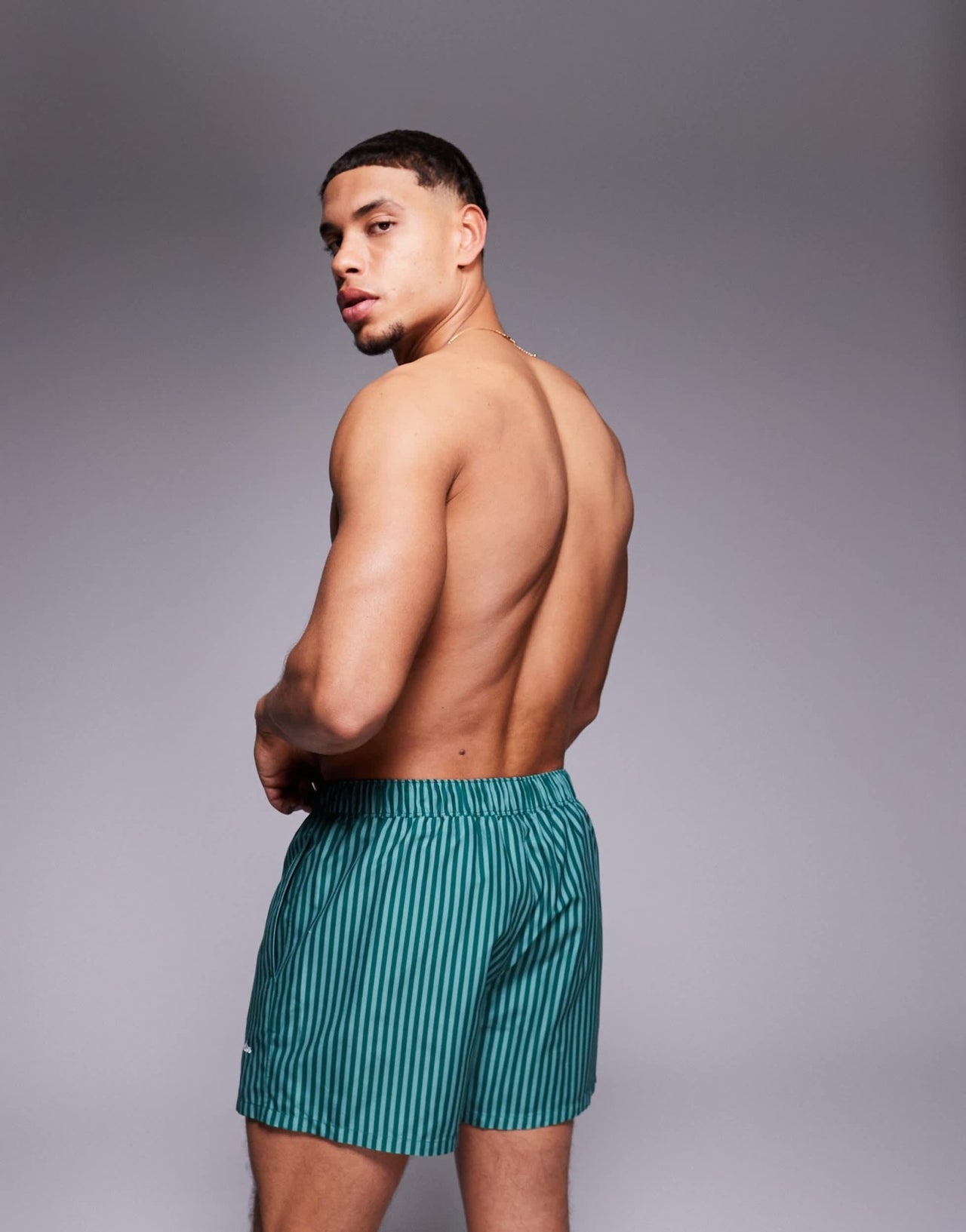 ASOS DESIGN swim shorts in short length in green stripe with placement print - ASOS Sample Sale